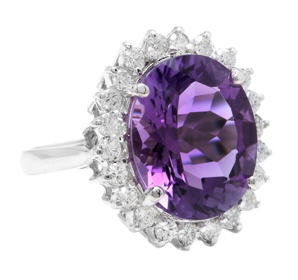 10.85 Carats Natural Amethyst and Diamond 18K Solid White Gold Ring

Total Natural Oval Shaped Amethyst Weights: Approx. 9.90 Carats 

Amethyst Measures: 16.00 x 12.00mm

Natural Round Diamonds Weight: .95 Carats (color G-H / Clarity SI1-SI2)

Ring