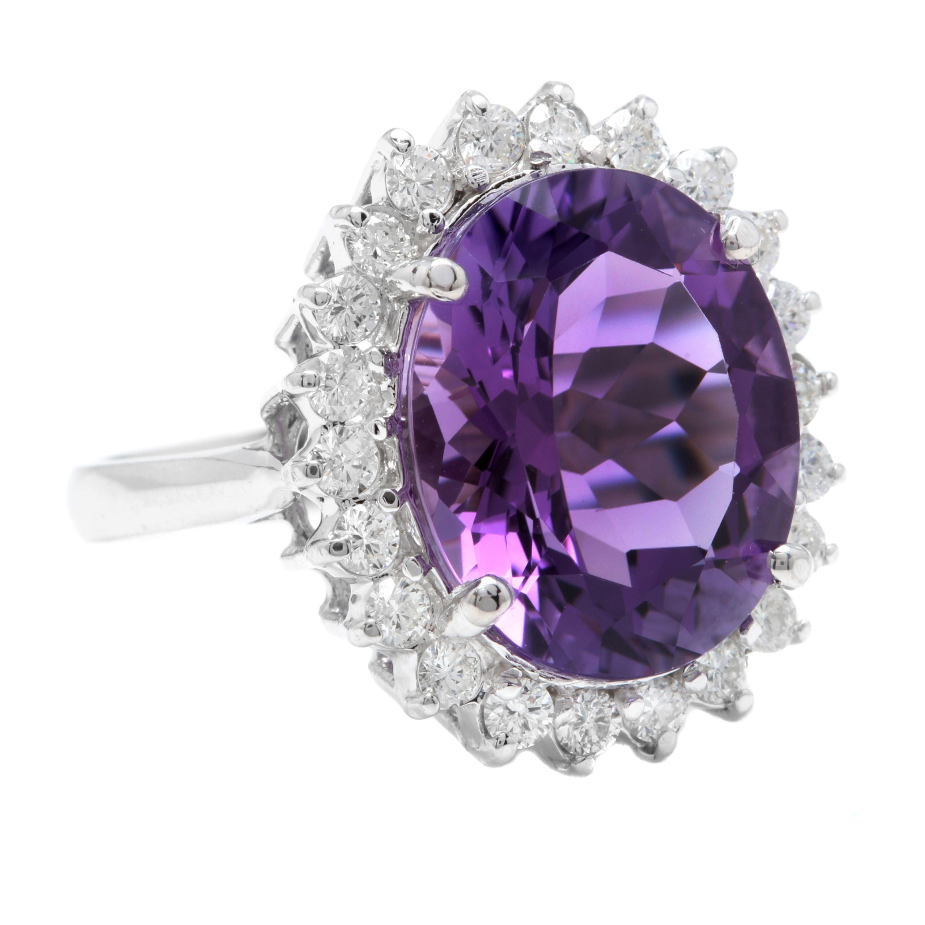 10.85 Carats Natural Amethyst and Diamond 18K Solid White Gold Ring

Total Natural Oval Shaped Amethyst Weights: Approx. 9.90 Carats 

Amethyst Measures: 16.00 x 12.00mm

Natural Round Diamonds Weight: .95 Carats (color G-H / Clarity SI1-SI2)

Ring