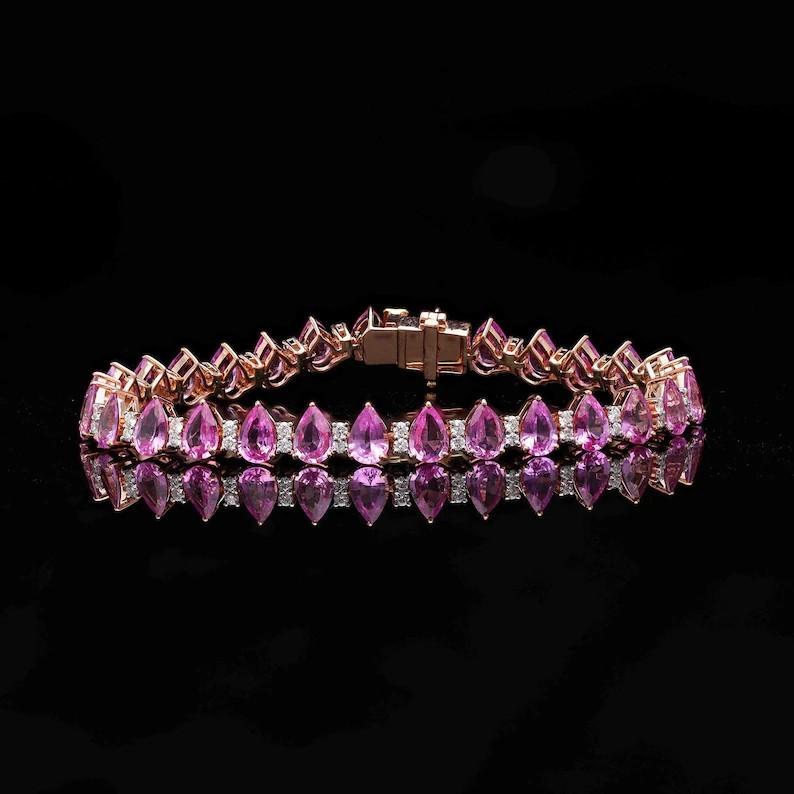 Contemporary 10.86 Carat Pear Cut Pink Sapphire Diamond 18 Karat Rose Gold Tennis Bracelet For Sale