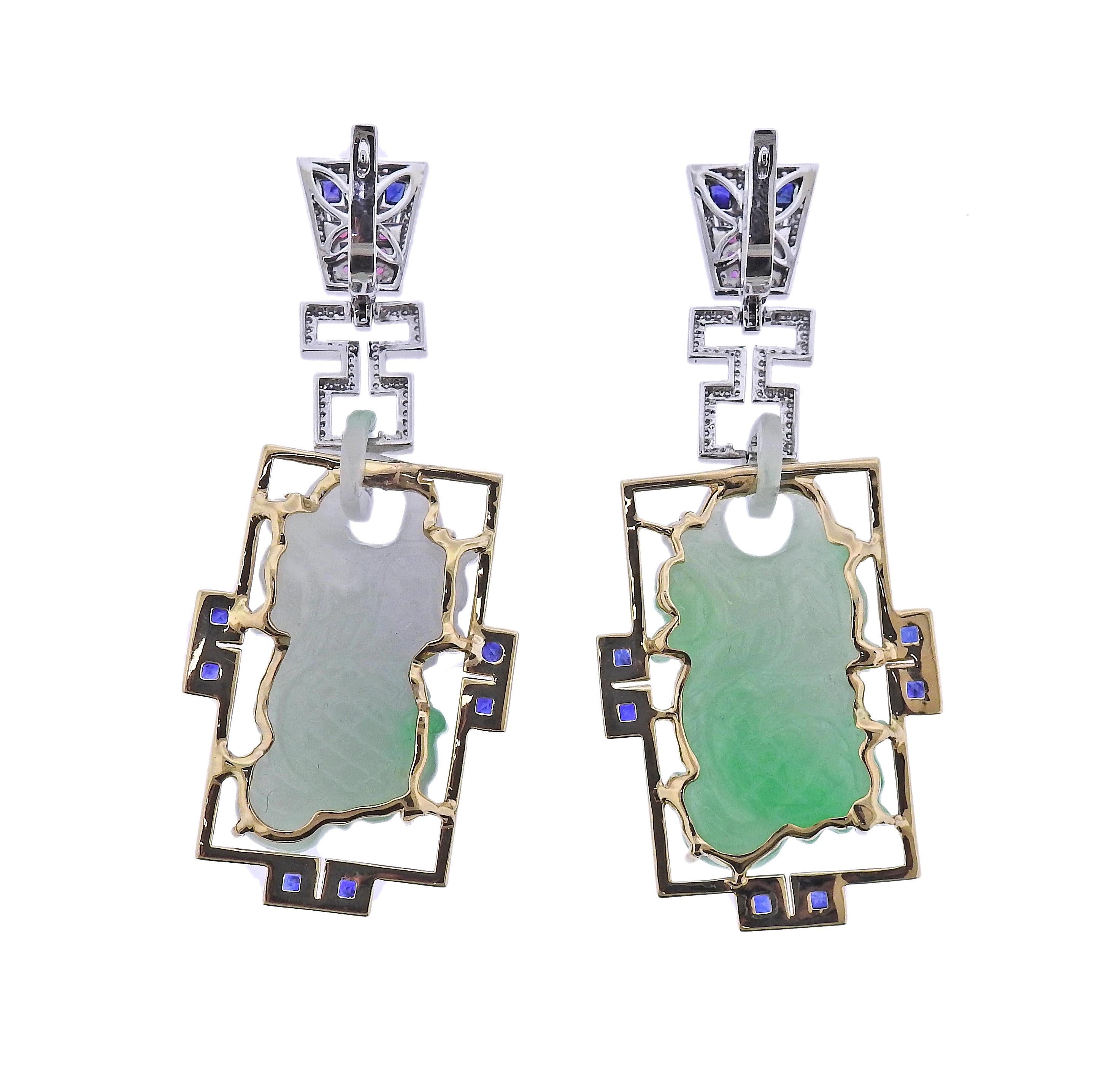 Pair of 14k gold long drop earrings, with 108.61ctw carved jadeite jade, pink and blue sapphires and 0.43ctw diamonds. Earrings are 67mm x 28mm. Marked: 585. Weight - 40.4 grams.