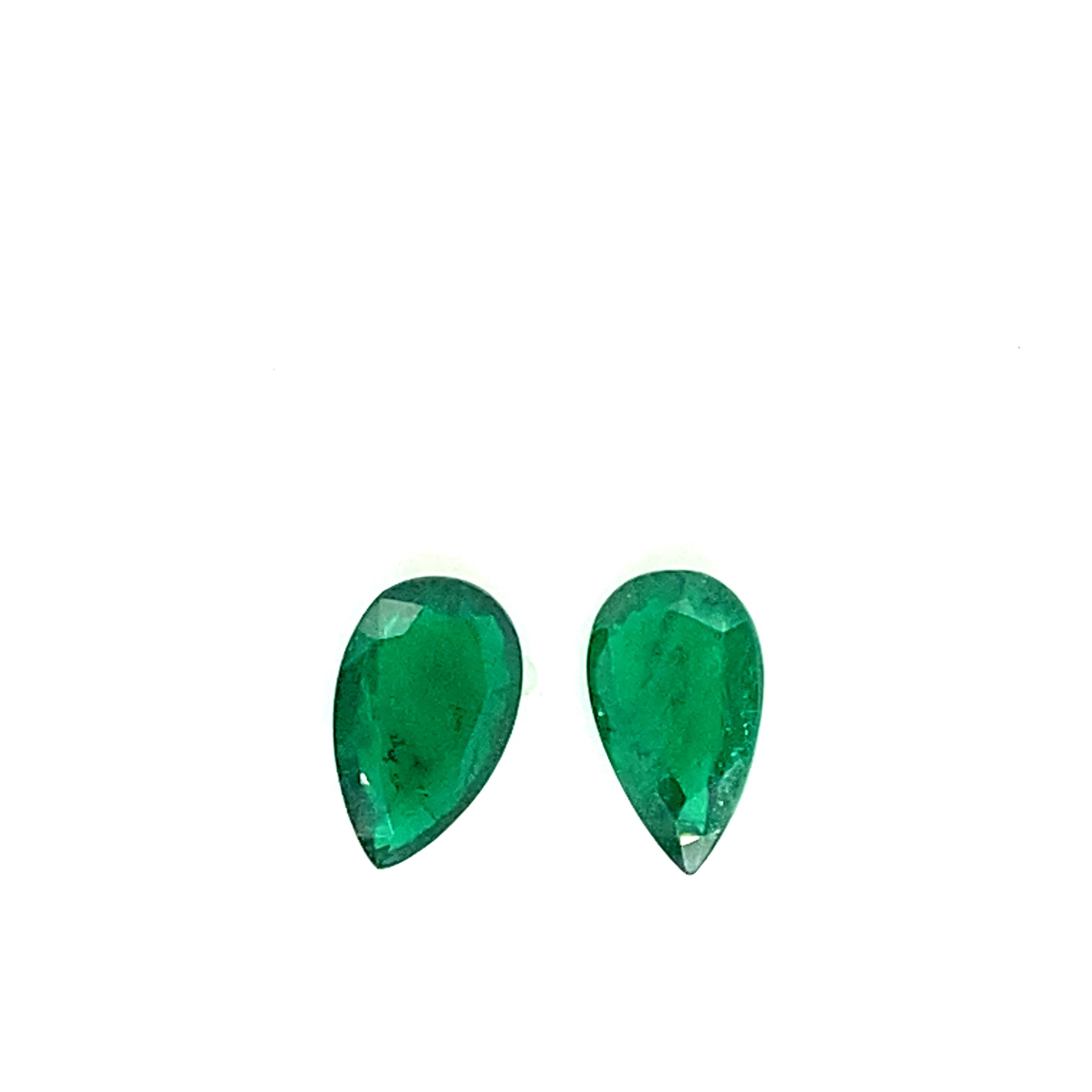 10.87 Carat GRS Certified Pear-Shaped Vivid Green Emerald Pair:

A gorgeous and rare gem, it is a pair of natural GRS certified pear-shaped vivid green Zambian emeralds weighing 10.87 carat. Hailing from Zambia, the emeralds have a vivid green