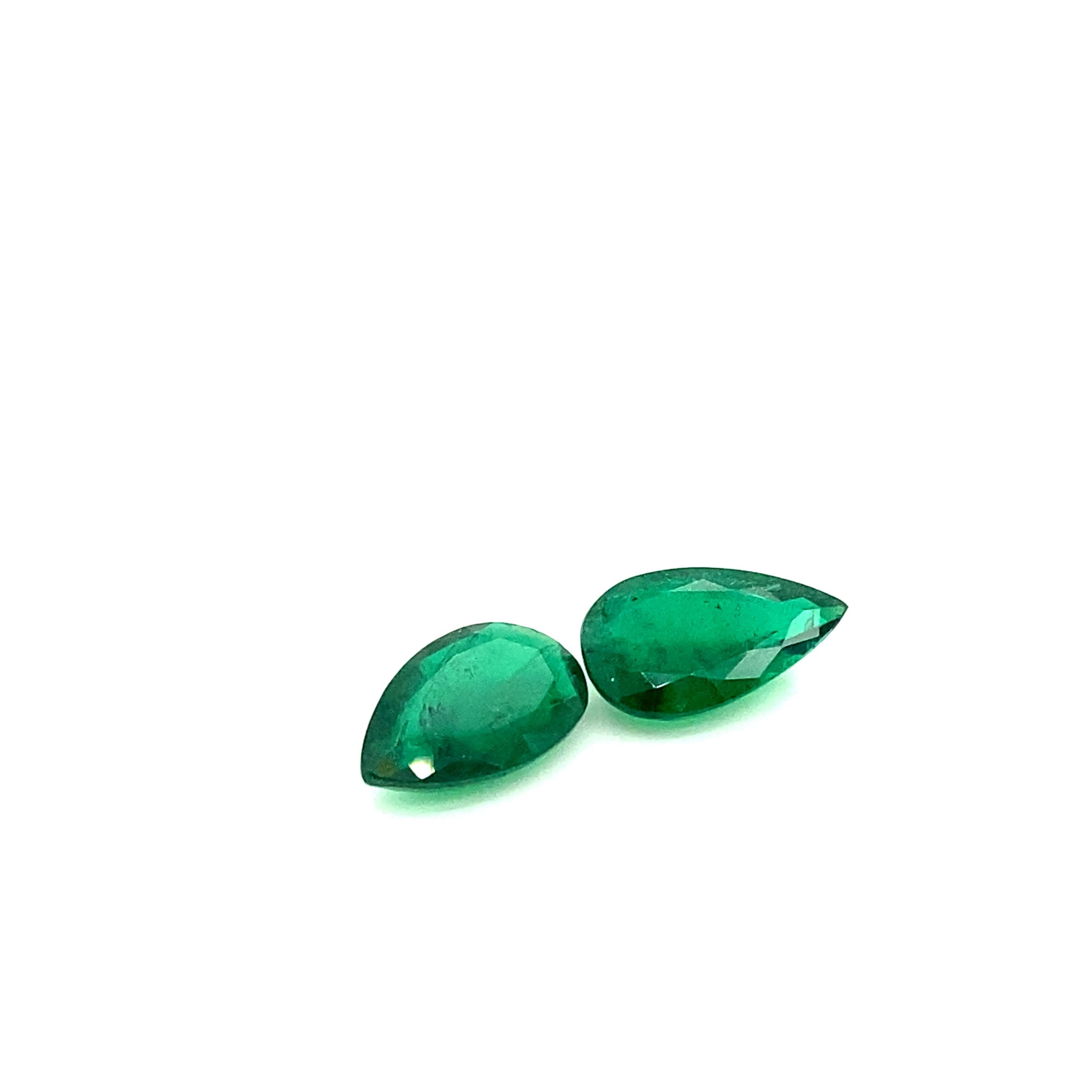 Modern 10.87 Carat GRS Certified Pear-Shaped Vivid Green Emerald Pair For Sale