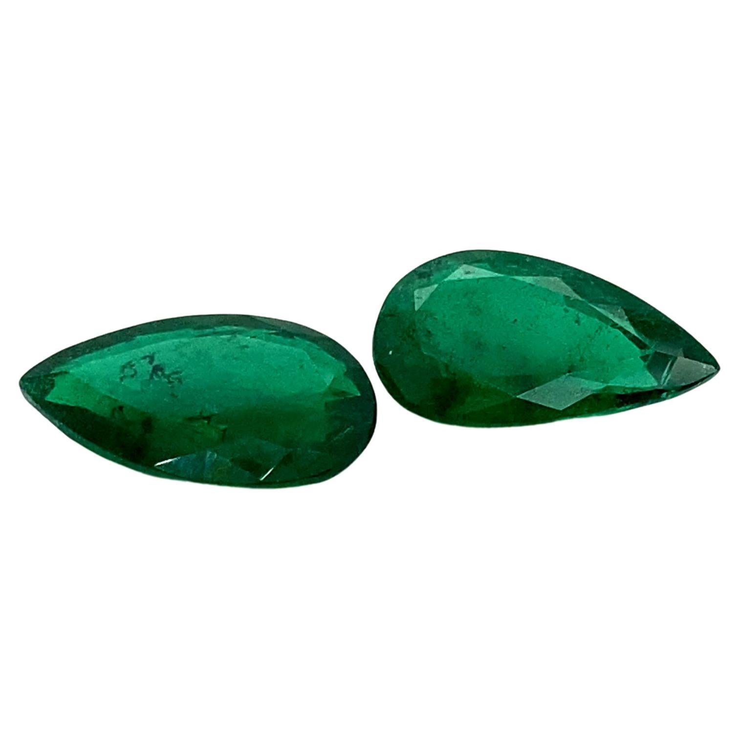 10.87 Carat GRS Certified Pear-Shaped Vivid Green Emerald Pair For Sale