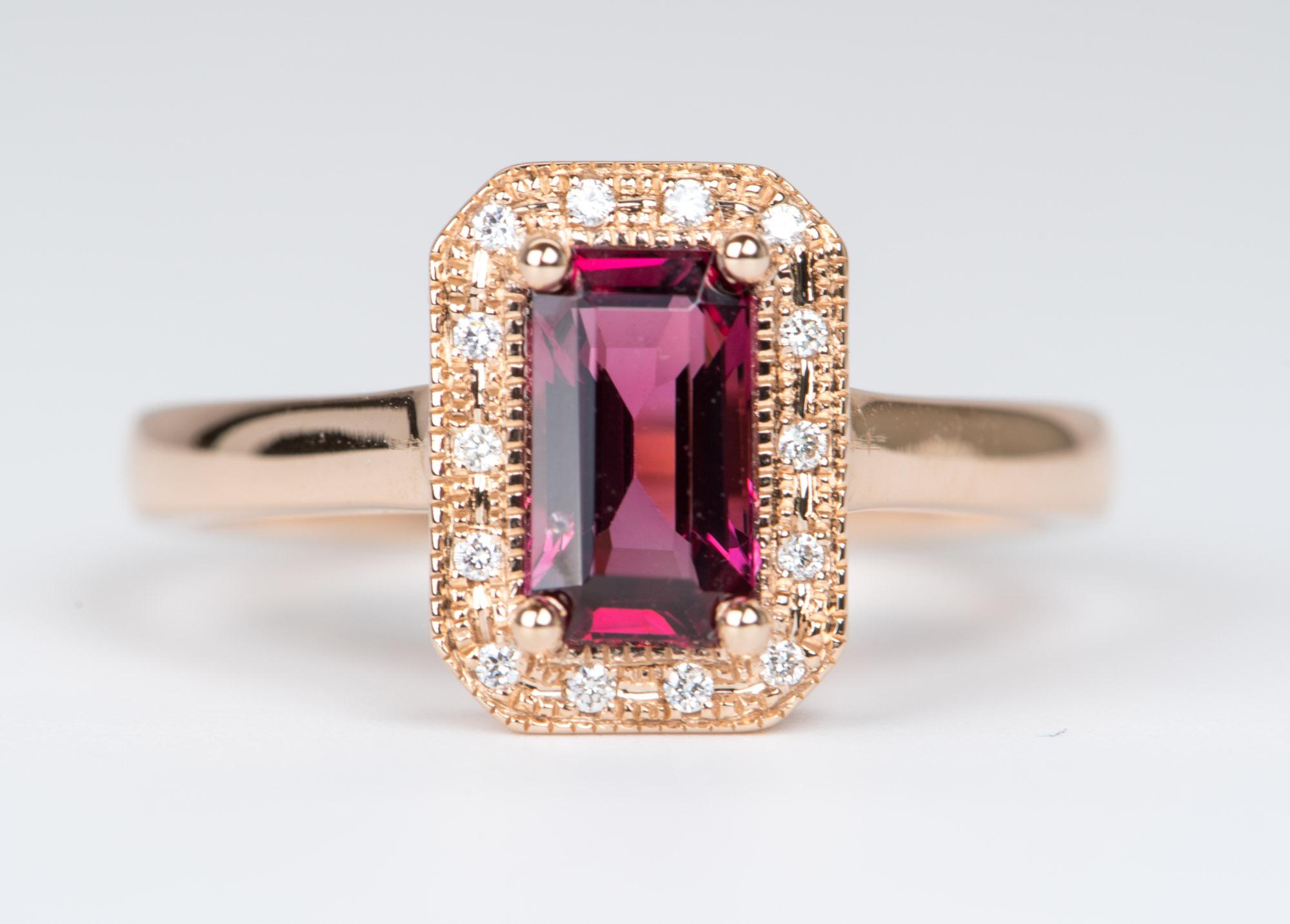 ♥  This is a solid 14k rose gold ring set with an emerald-cut deep fire red spinel in the center, flanked by a textured diamond halo. 
♥  The overall setting measures 8.5mm in width, 10.9mm in length, and sits 4.8mm tall from the finger

♥  Ring