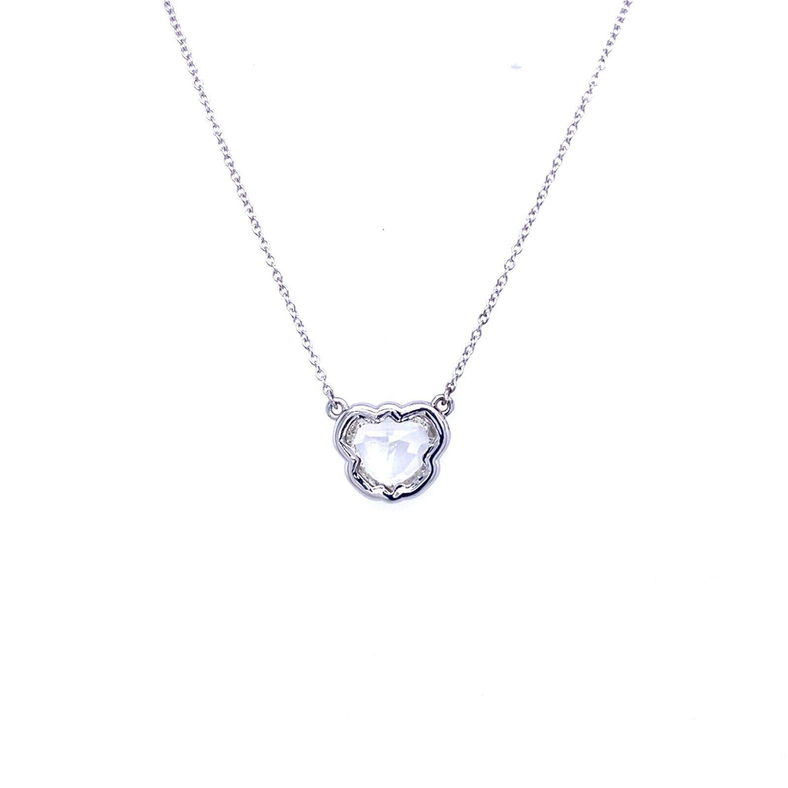 This Diamond pendant features a 1.08ct natural shield-shaped diamond that is graded H-I/VS clarity   The diamond is set in a 18ct White Gold frame and can be worn with a 16-inch or 18-inch 18ct White Gold chain. This pendant is a perfect gift for
