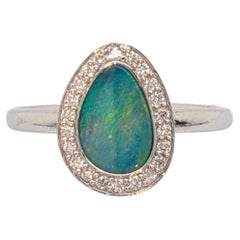 1.08cts Boulder Opal Ring with Diamond Accents in 14K Gold (Bague d'opale de Boulder avec accents de diamant en or 14K)  De forme fantaisie 9x7 mm