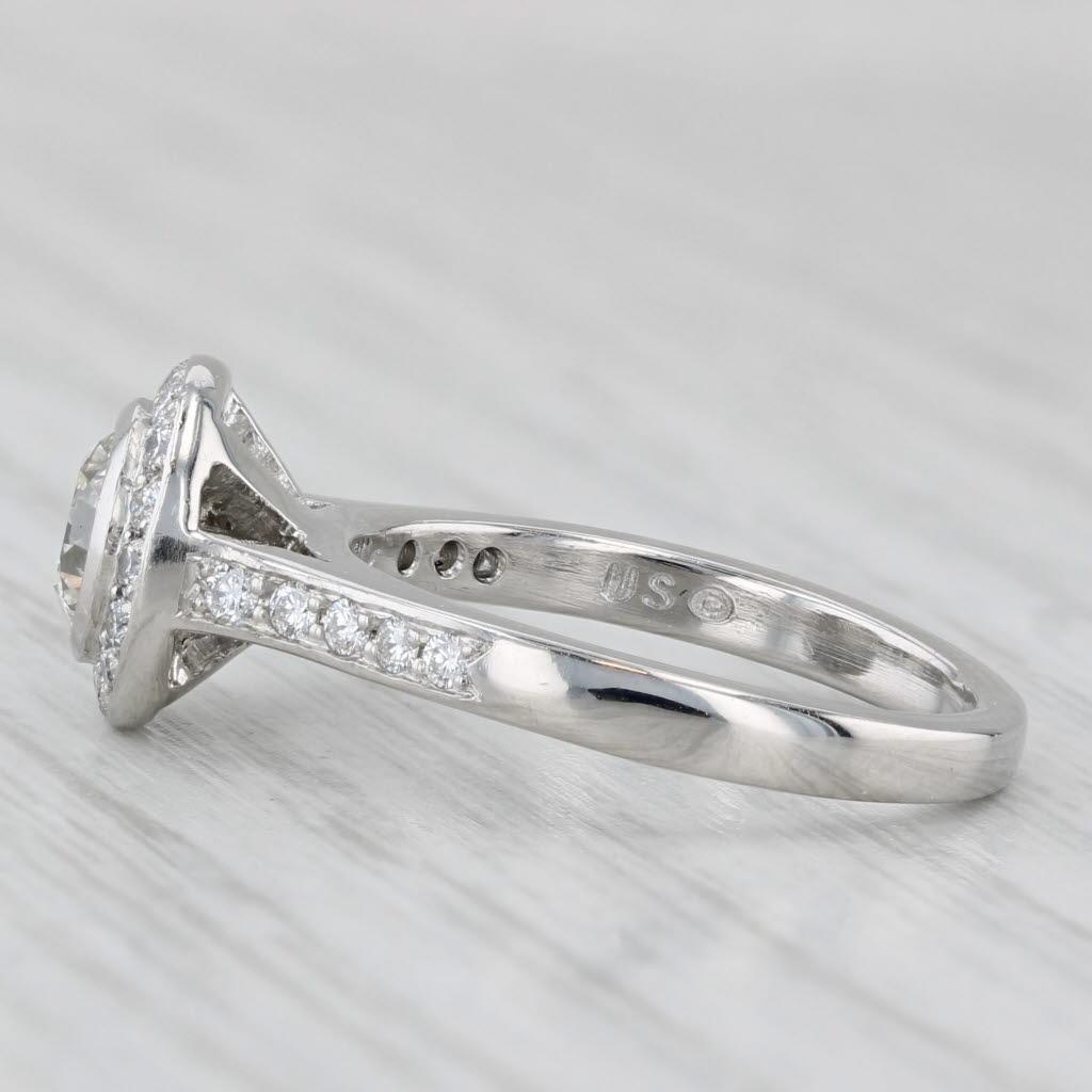 Gemstone Information:
- Natural Diamond -
Carats - 0.75ct
Cut - Round Brilliant
Color - K
Clarity - VS2

- Natural Diamonds -
Total Carats - 0.18ctw
Cut - Round Brilliant
Color - G. H
Clarity - VS2

- Natural Diamonds 
Total Carats - 0.15ctw
Cut -