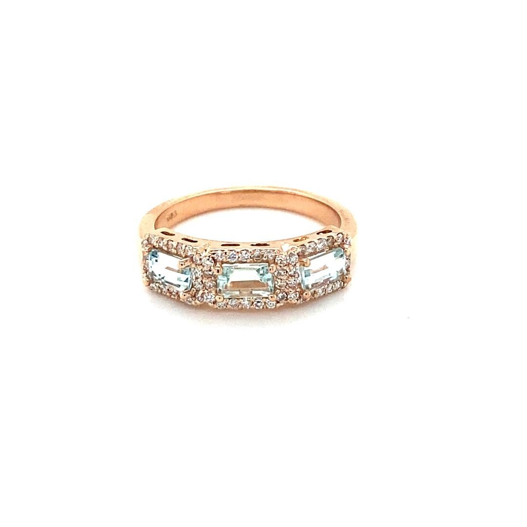1.09 Carat Aquamarine Diamond 3-Stone Rose Gold Cocktail Band
Simple yet Elegant.....This classic design is going to elevate your accessory wardrobe!   

Item Specs:

3 Straight Cut Baguette Cut Aquamarines weighing 0.82 Carats
54 Round Cut Diamonds