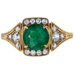 1.09 Carat Green Colombian Emerald Set in an 18 Karat Yellow Gold Ring