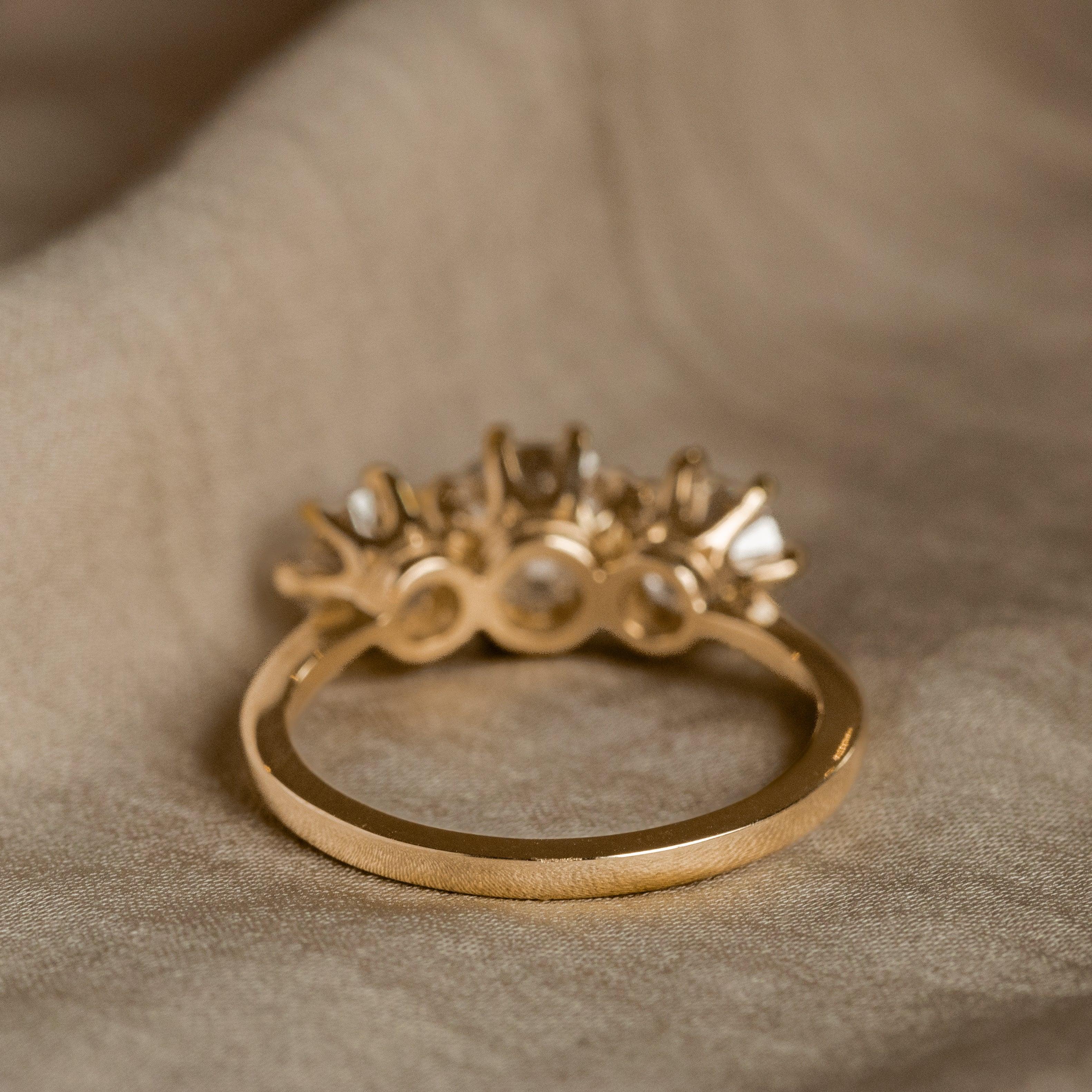 Era: New Victorian Inspired
Composition: 18K Yellow Gold
Primary Stone: Old European Cut Diamond
Carat Weight: 1.09 Carats
Color/Clarity: J / VS2
GIA Report Number: 2225663386
View the GIA Report
Accent Stone: Old European Cut Diamond
Carat