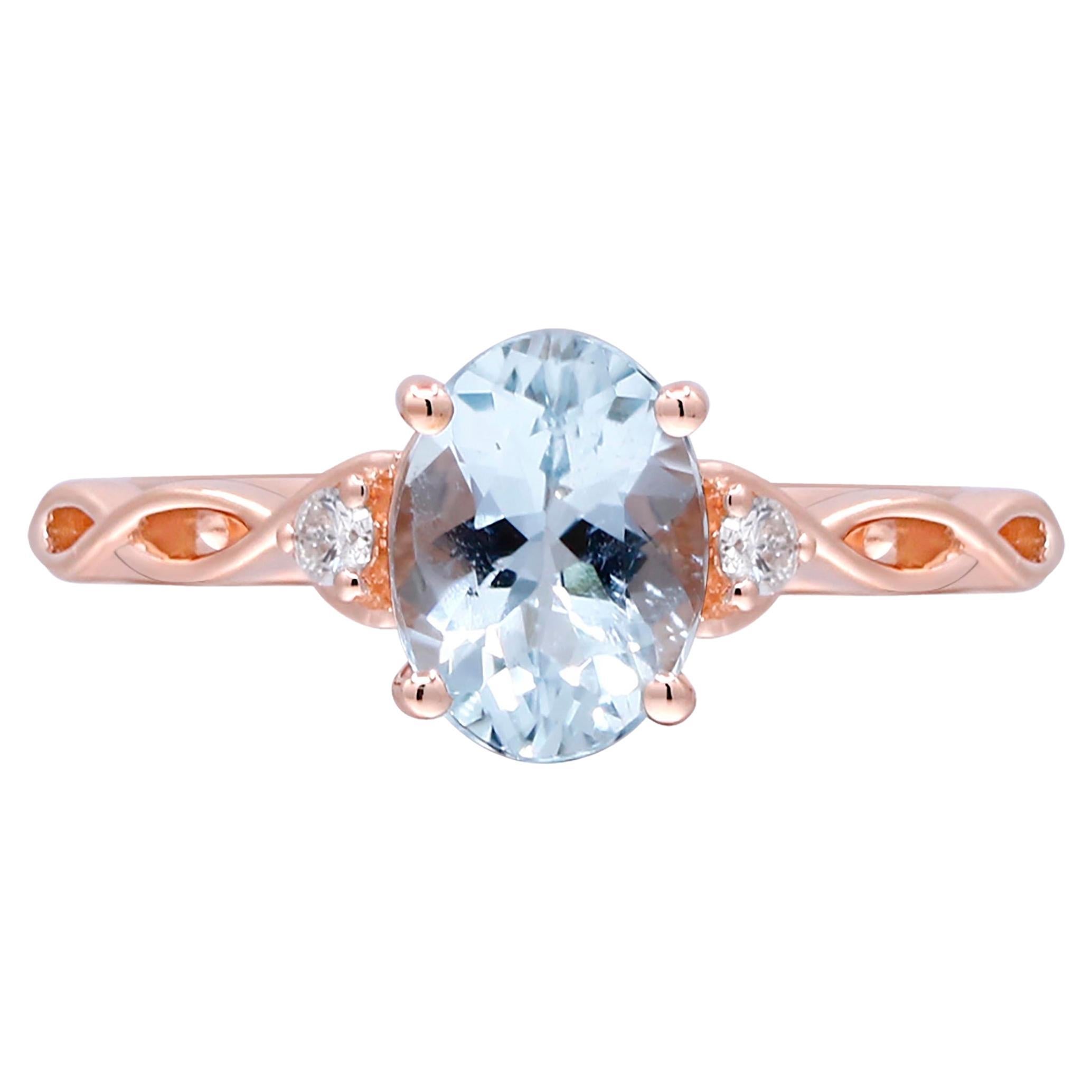 1.09 Carat Oval-Cut Aquamarine with Diamond Accents 14K Rose Gold Ring For Sale