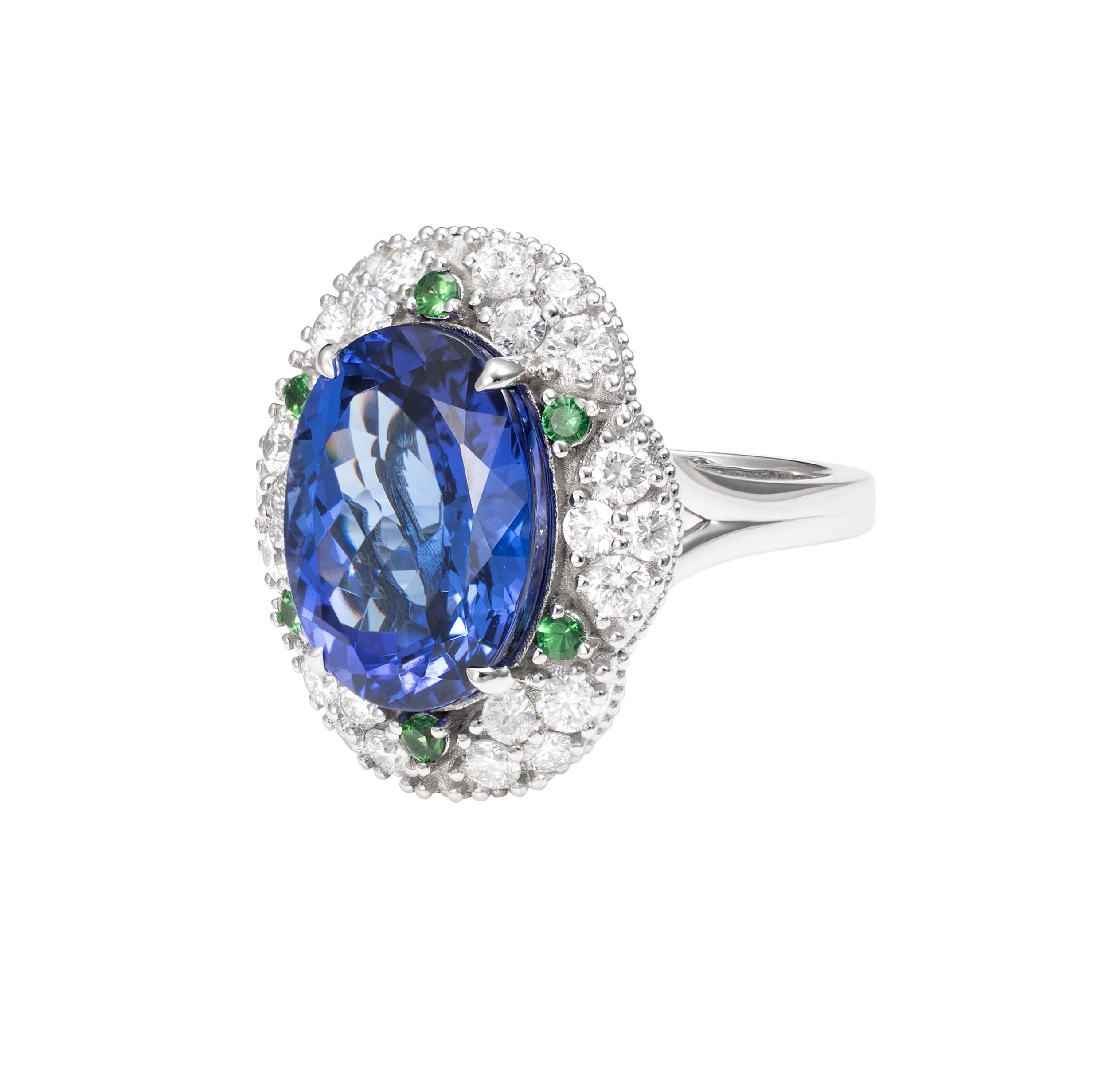 Oval Cut 10.9 Carat Tanzanite with Tsavorite & Diamond Ring in 18 Karat White Gold For Sale