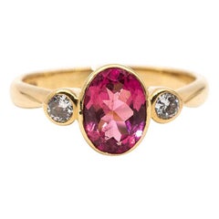 1.09 Carat Vivid Pink Tourmaline and Diamond 18 Carat Gold Three-Stone Ring