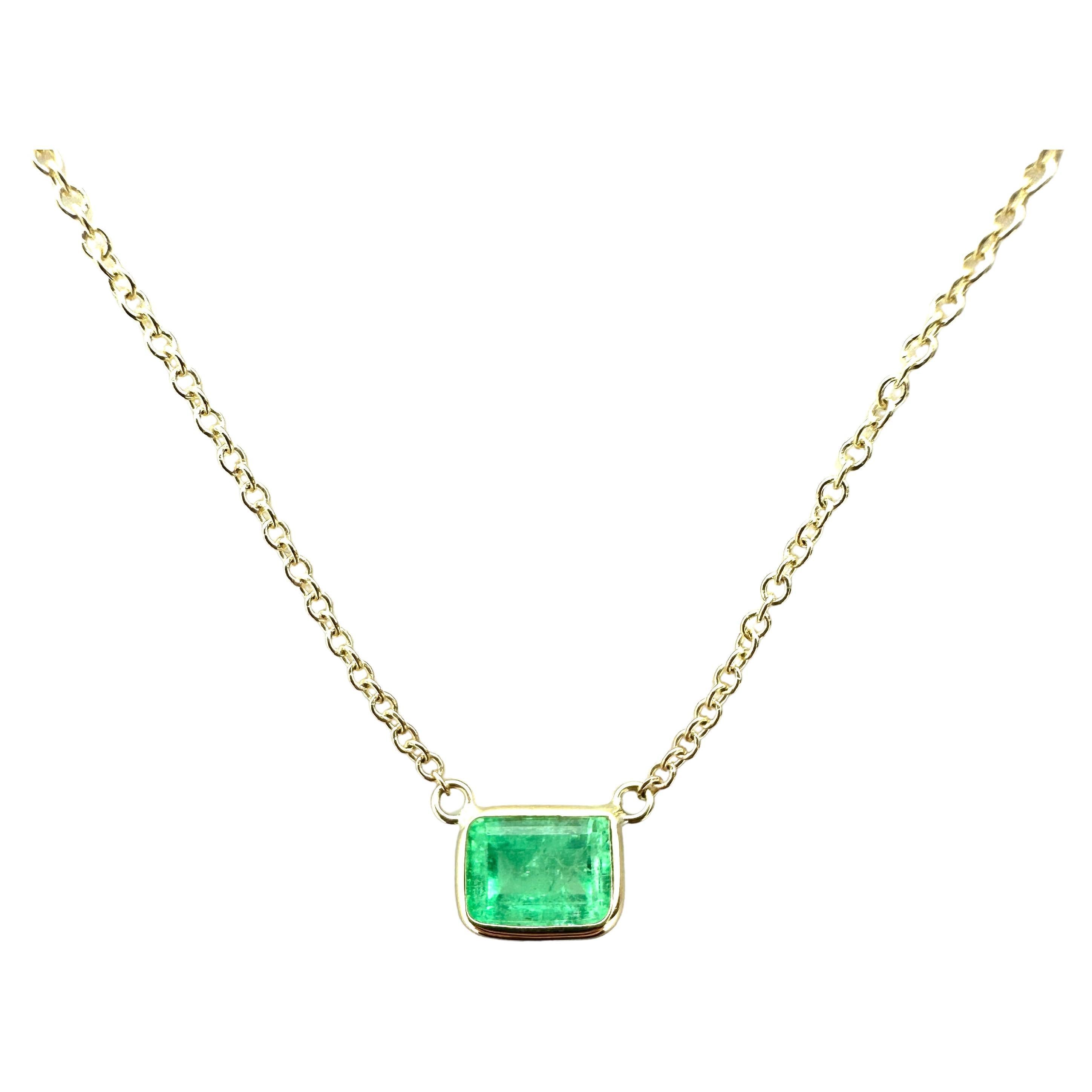 1.09 Carat Weight Green Emerald Emerald Cut Solitaire Necklace in 14k Yellow G For Sale