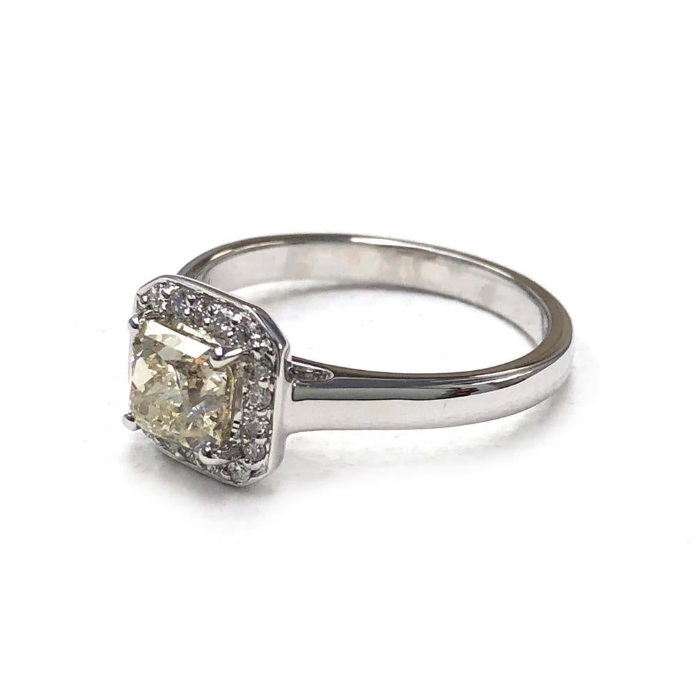 1.09 Carat Square Shape Yellow Diamond and 0.18 Carats White Diamond 18K White Gold Engagement Ring

Center Stone Details: 
Stone: Yellow Diamond (untreated)
Shape: Square Emerald-cut 
Size: 5.60mm x 5.40mm
Weight: 1.09 carat
Quality: I1, Natural