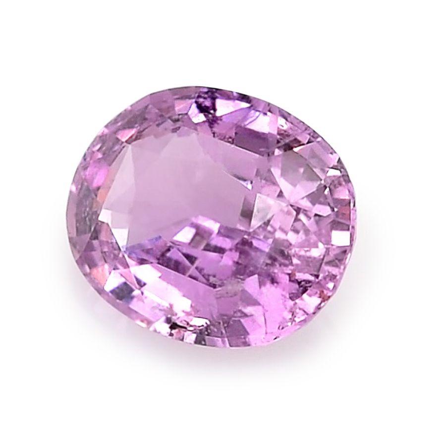 Presenting an exquisite Natural Pink Sapphire, gracing us with a carat weight of 1.09 carats. This gem takes on an elegant oval shape, measuring 6.85 x 5.62 x 3.38 mm, and features a brilliant/step cut that ensures it sparkles brilliantly. Its