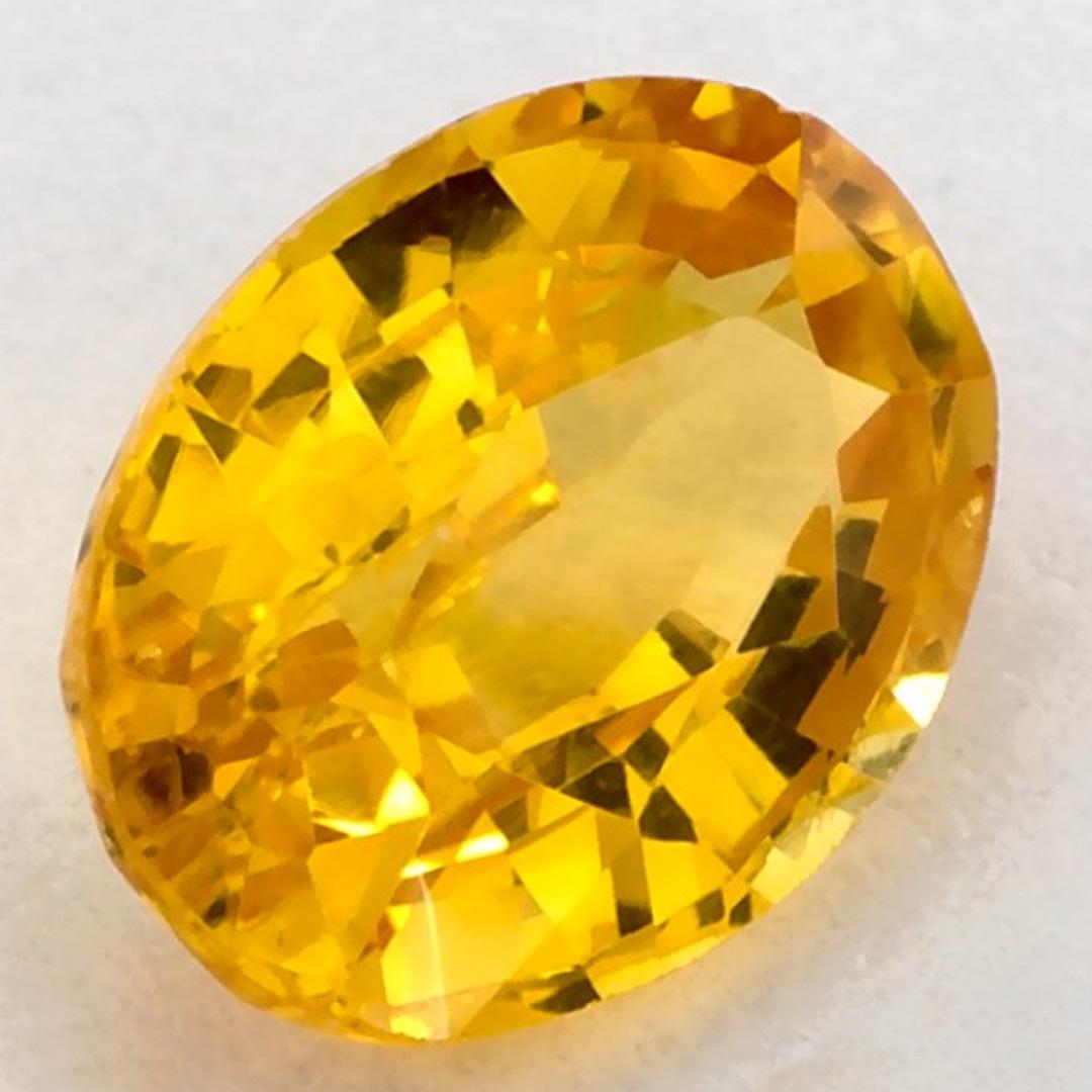 This natural Yellow sapphire offers elegance and sophistication. With its rich color saturation and precise cutting, it is the perfect centerpiece for an engagement ring or luxury jewelry design.

This sapphire originates from Sri Lanka (Ceylon),