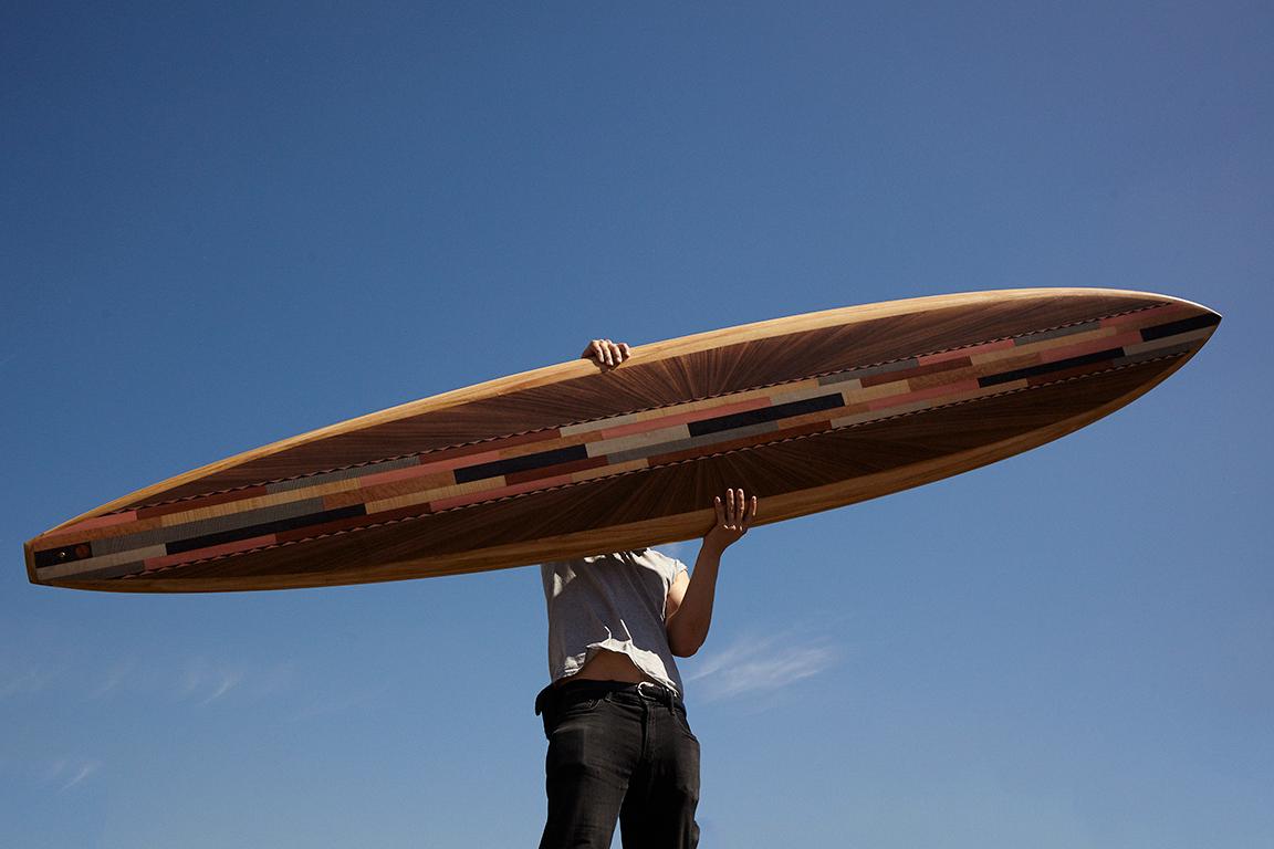 This is a unique custom surfboard featuring a marquetry deck with copper inlay, designed and hand-crafted by the w o o d p o p studio which specialises in marquetry and inlay work. 

The studio prides itself on constantly challenging the limits of