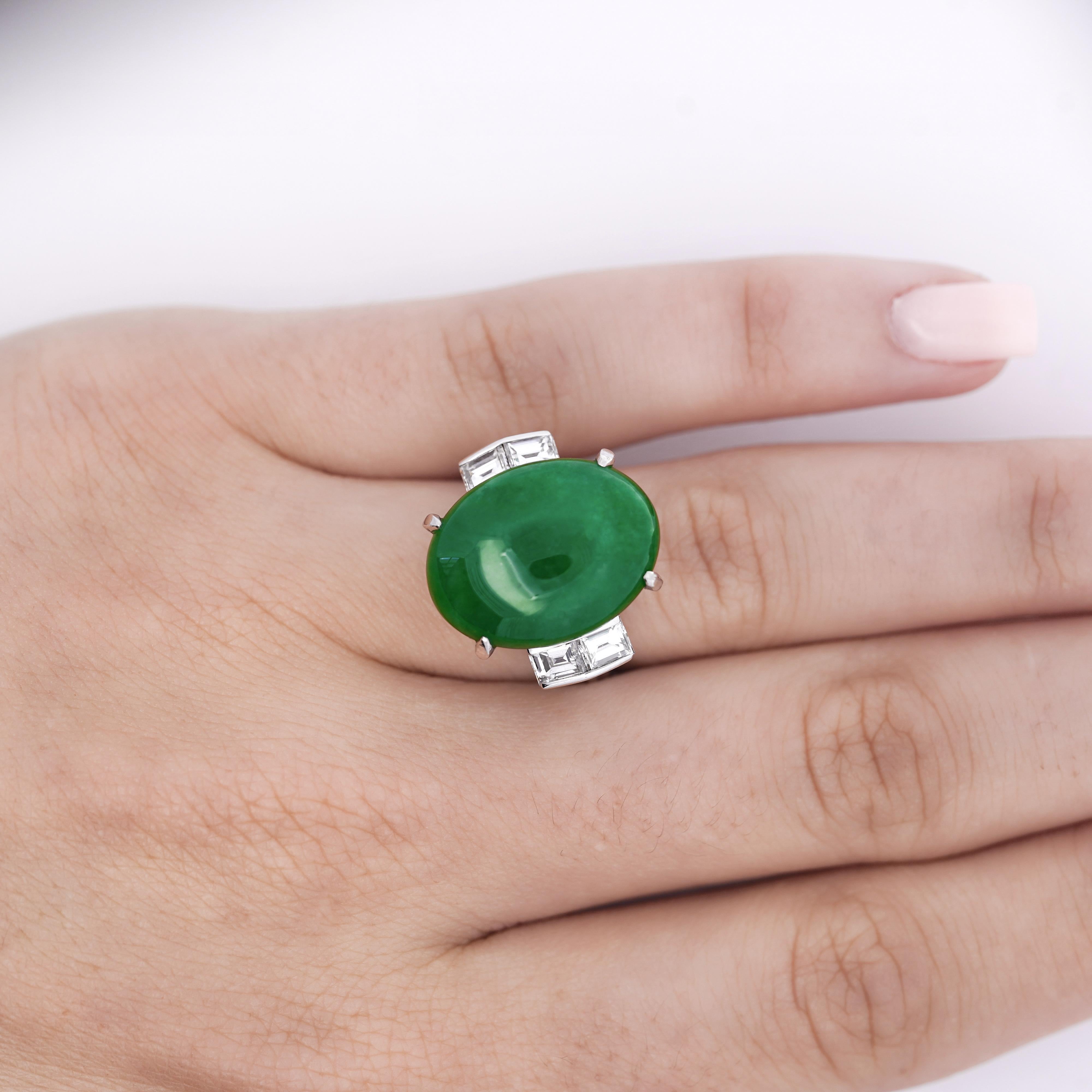 10.91 carat oval cabochon cut natural jadeite jade and baguette diamond side side stone ring in platinum 900 filigree setting. Handmade, with all natural gemstones and an adjustable ring size of 6.5 US. 

Details: 
Item Type: Cocktail Ring
Metal:
