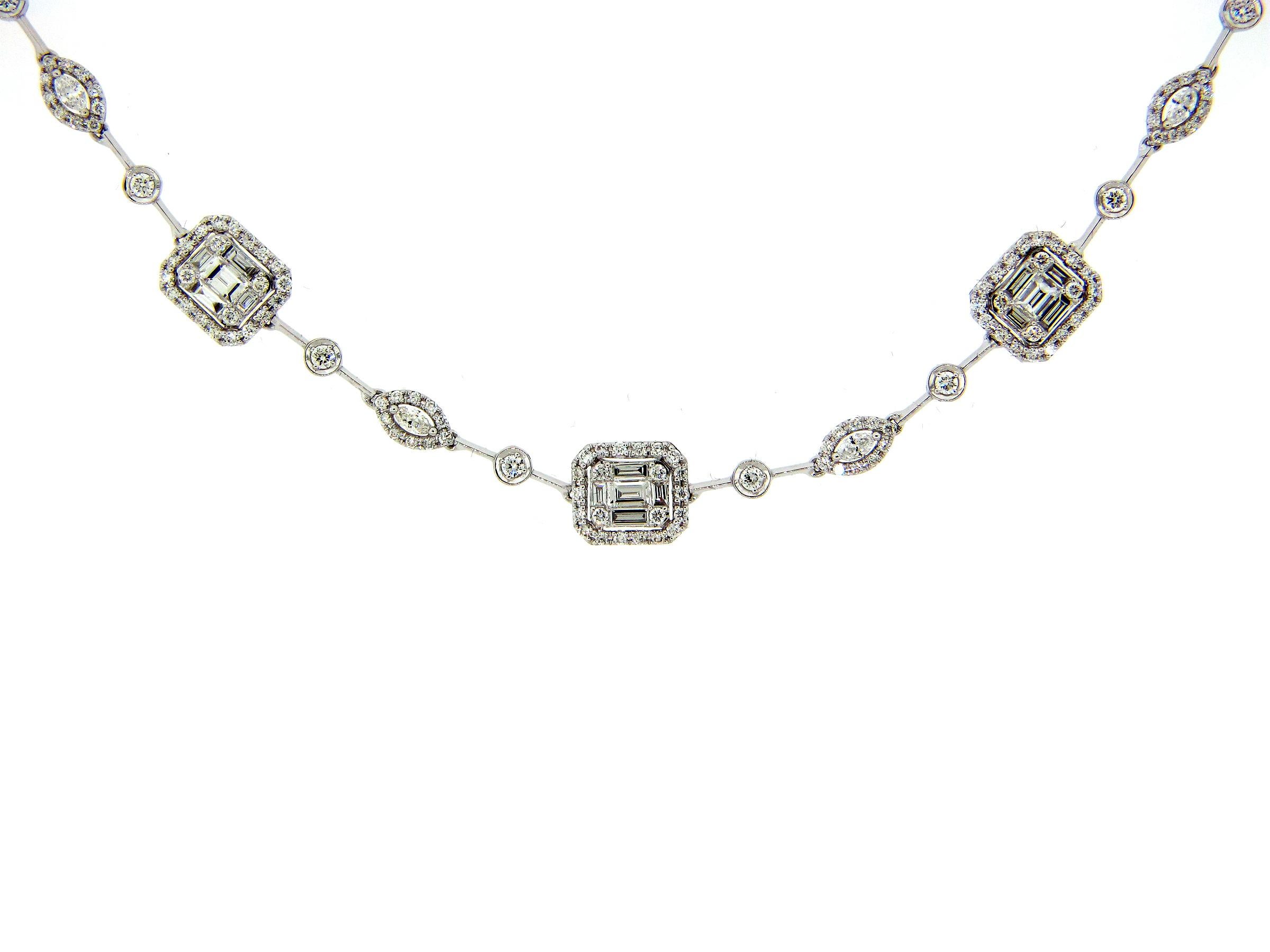 This stunning necklace features 26 emerald cut diamond clusters, each comprising of 5 baguette cut and 4 round diamonds. Each cluster is surrounded by a halo of round white diamonds. This necklace is secured with a hidden clasp and safety lock, and