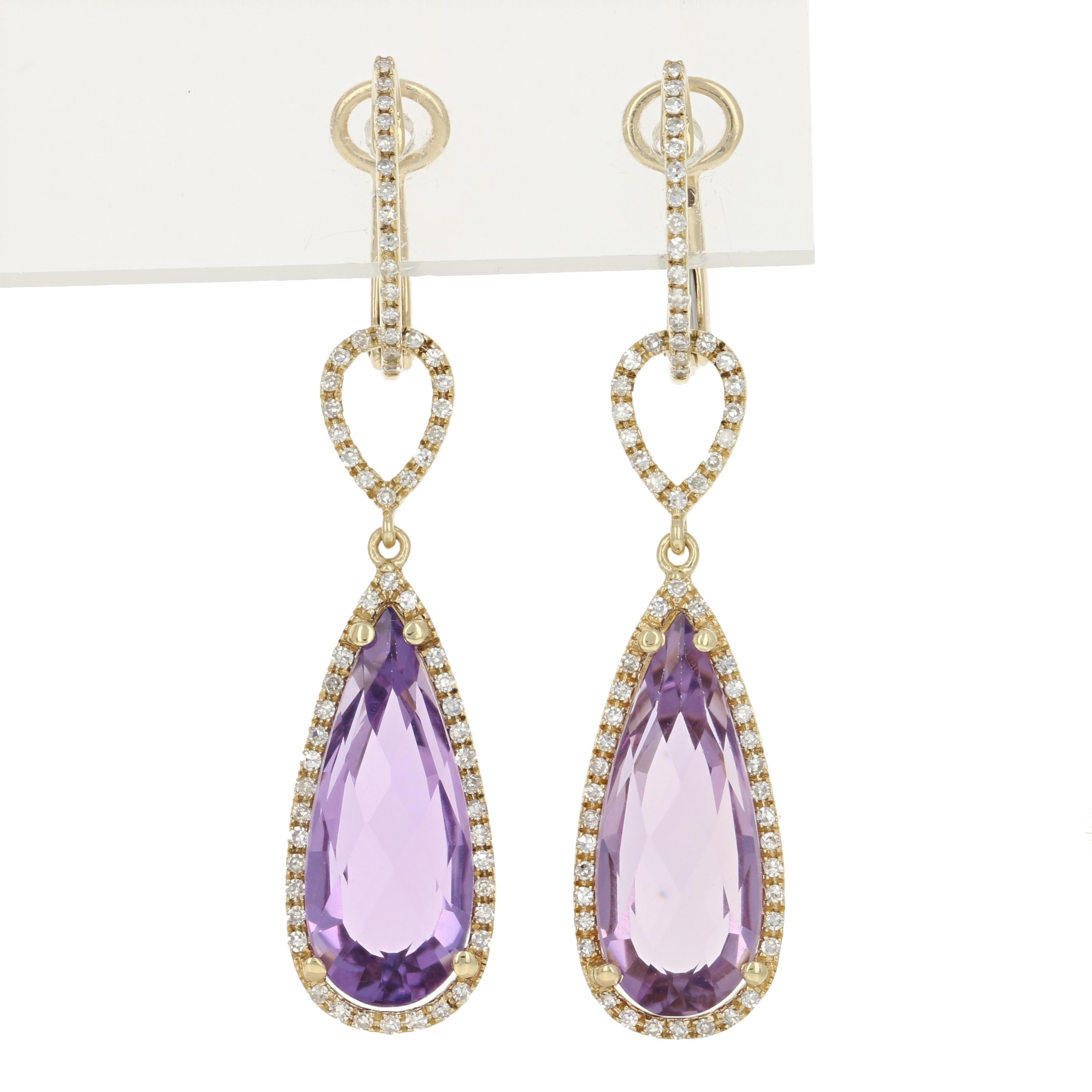 Regal beauty and sparkling color await with this elegant jewelry set! Featuring a pair of dangle earrings and a pendant necklace, this matching set showcases a halo design created with luminous amethysts and white diamonds set in 14k yellow gold. 