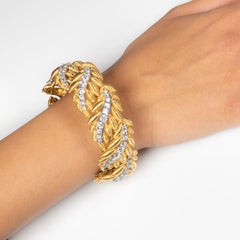 10.95 Carat of Round Brilliant Diamonds in 18 Karat Gold Leaf Design Bracelet