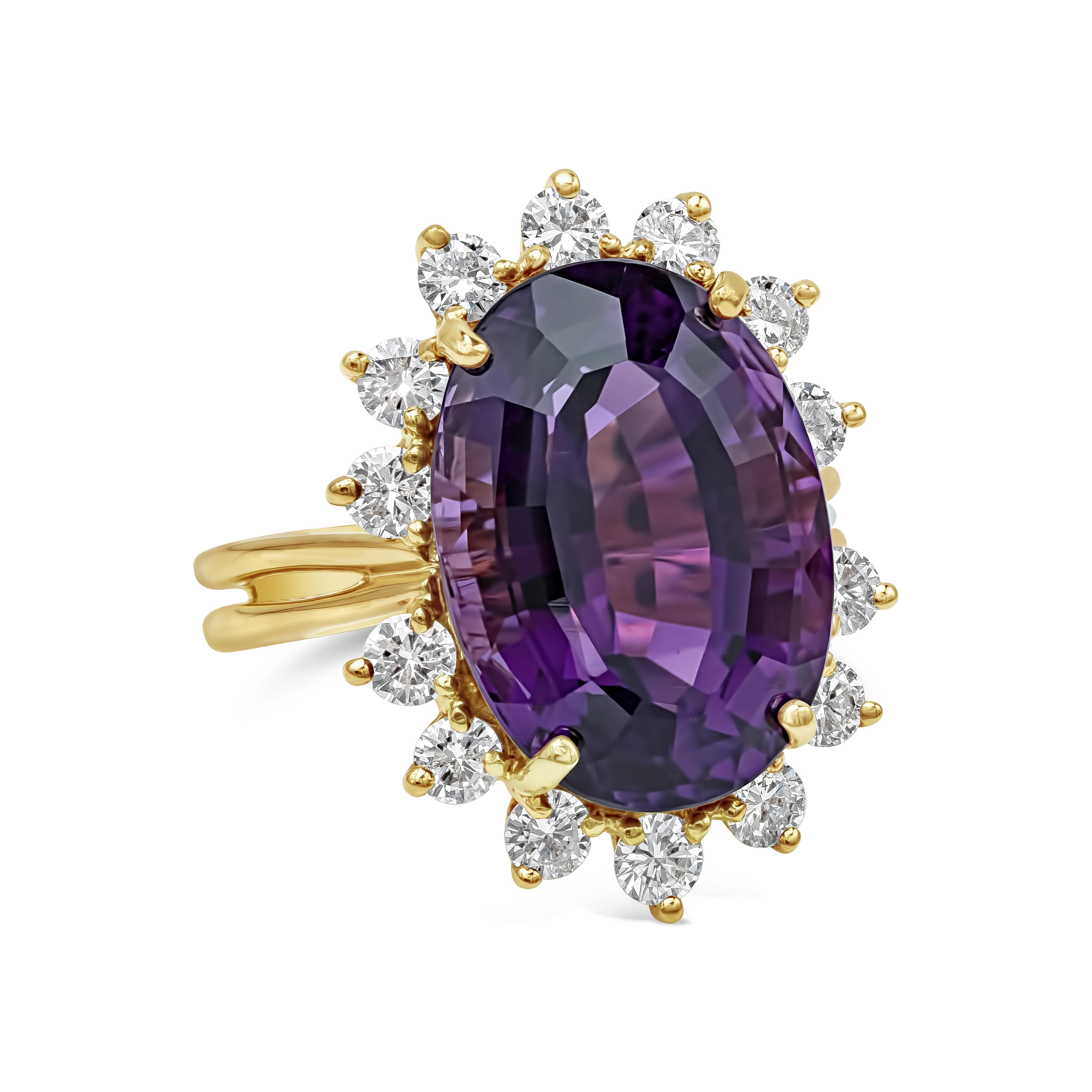 A beautiful and stunning cocktail ring showcasing a vibrant 10.95 carats oval cut purple amethyst, surrounded by a row of round brilliant diamonds, set in a two row 18k yellow gold mounting. Diamonds weigh 1.15 carats total and are approximately F