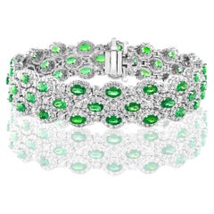 Bracciale a 3 file di smeraldi e diamanti taglio ovale da 10,95 carati in oro bianco 14K