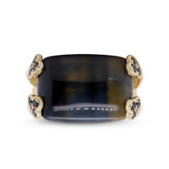 10.96 Carat Blue TigerEye and 0.04 Carat Blue Sapphire 14 Karat Yellow Gold Ring