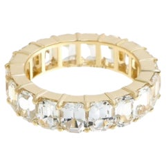 10.96 Carat Emerald Cut White Sapphire Eternity Band in 18 Karat Yellow Gold