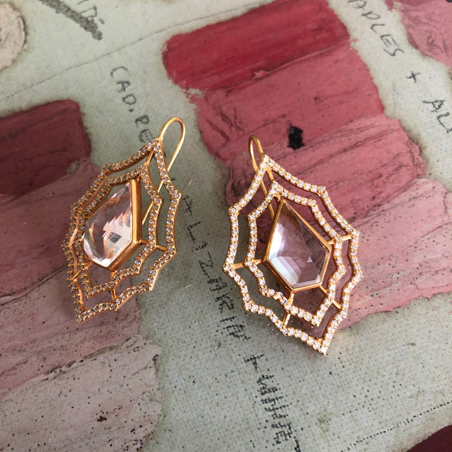 Designed by award winning jewelry designer, Lauren Harper, these stunning pale pink 10.96 carat hexagon faceted Kunzites are at the center of these Diamond earrings.  Set in 18kt yellow Gold with 1.26cts white faceted Diamonds in 2 tiers of