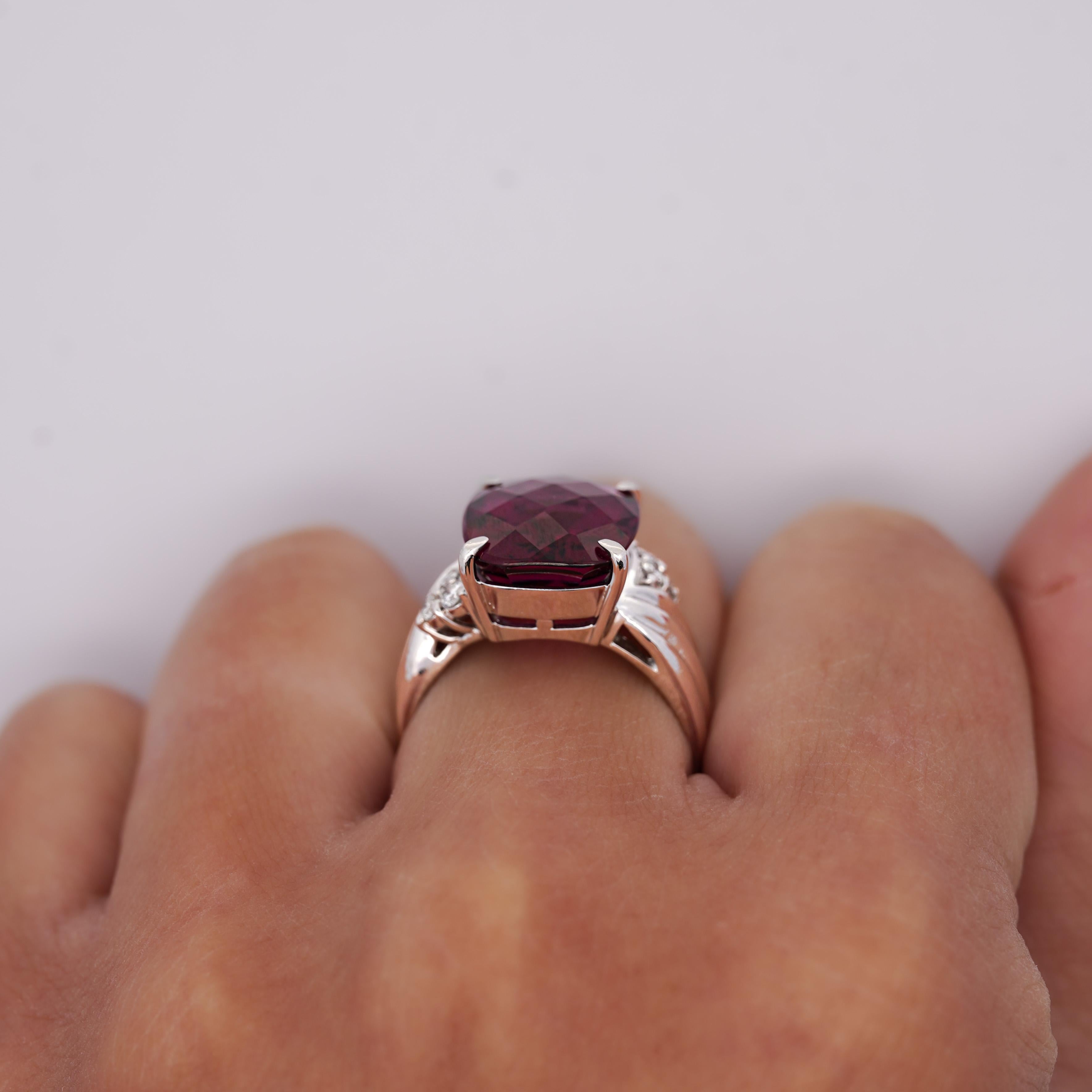 10.96 Carat Cushion Checkerboard Cut Rubellite Tourmaline and Round Cut Diamond in Platinum 900 Ring in Size 7.75. 

Details: 
 Item Type: Cocktail Ring 
 Metal: Platinum 900
 Size: 7.75 (adjustable)
 Weight: 12.78 Grams
 
Center Gemstone Details:
