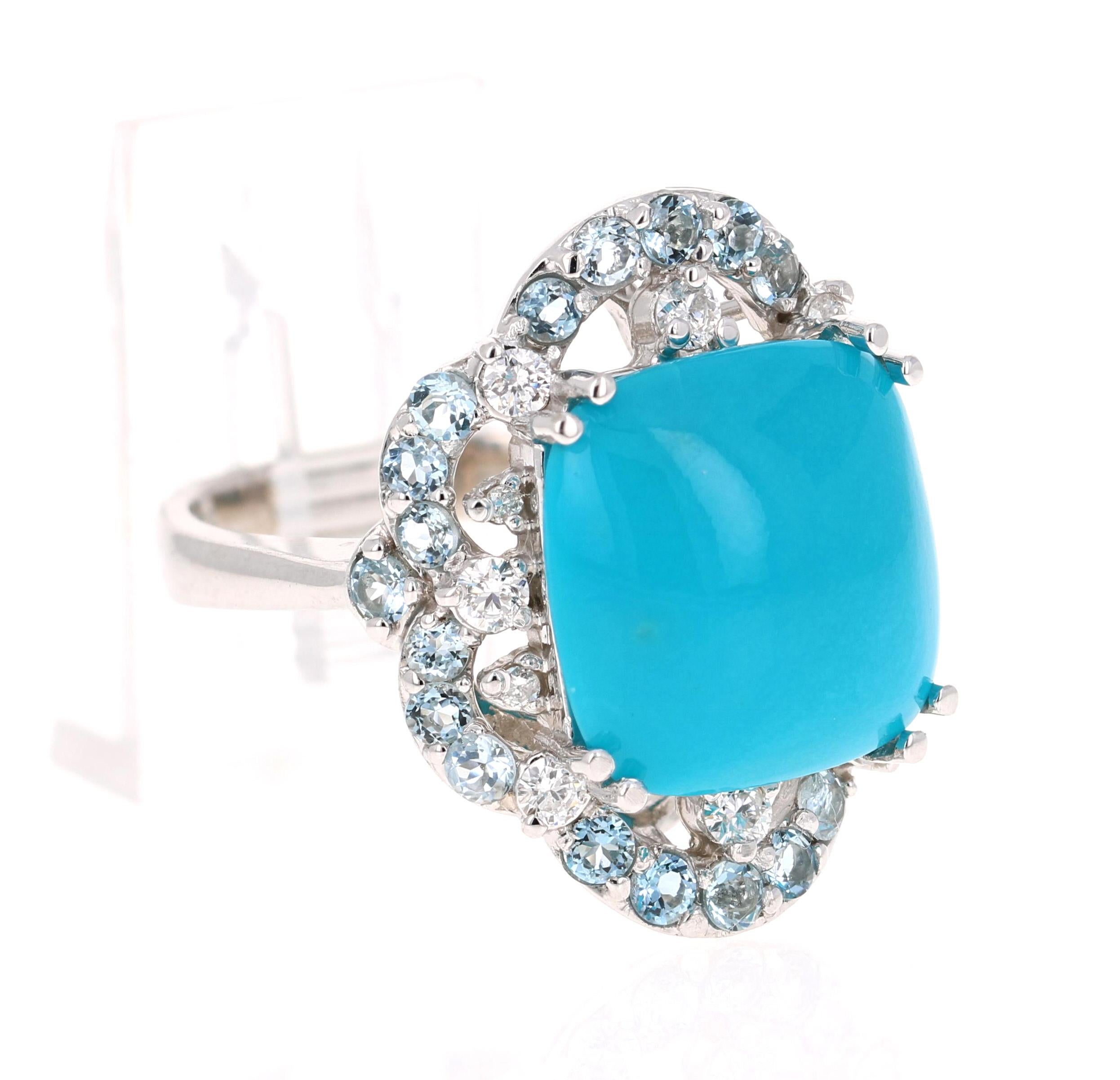 
The Cushion Cut Turquoise is 9.42 Carats and is surrounded by beautiful Aquamarines weighing 1.13 Carats. Also it has 12 Round Cut Diamonds weighing 0.41 Carats. (Clarity: SI, Color: F) The total carat weight of the ring is 10.96 Carats. The