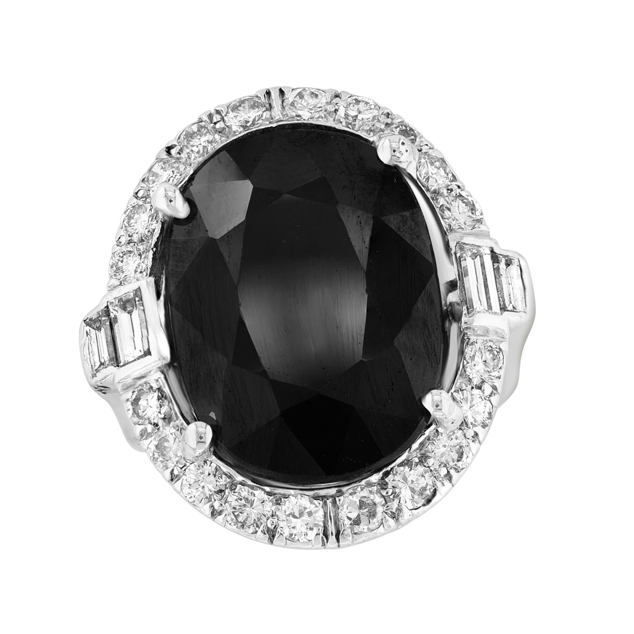 10.96 Ct Mid Night Blue Sapphire & 1 Ct Diamond Cocktail Ring in Platinum, Estate Piece
 Round Brilliant cut diamonds approximately 1ct is surrounding the center stone
platinum 12.6 grams
10.96 Ct Natural Mid night Blue Sapphire , They tend to be