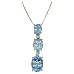 10.97 Collana in oro bianco con diamante rotondo e acquamarina