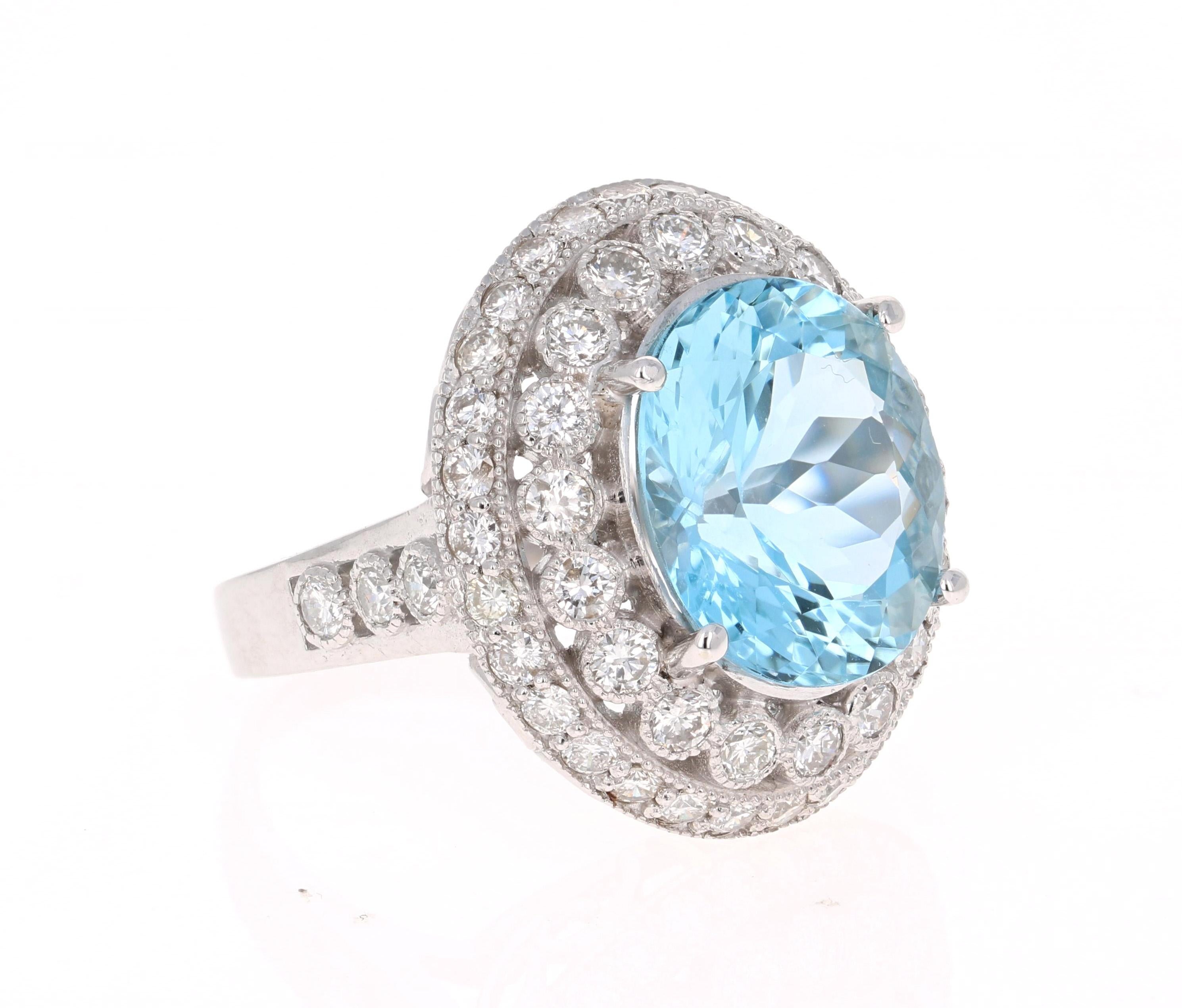 This ring has a beautiful 8.62 Carat Oval Cut Aquamarine and is surrounded by 54 Round Cut Diamonds that weigh 2.35 carat (Clarity: SI1, Color: F). The total carat weight of this ring is 10.97 carats. 
The Aquamarine is 15 mm x 8 mm and has a