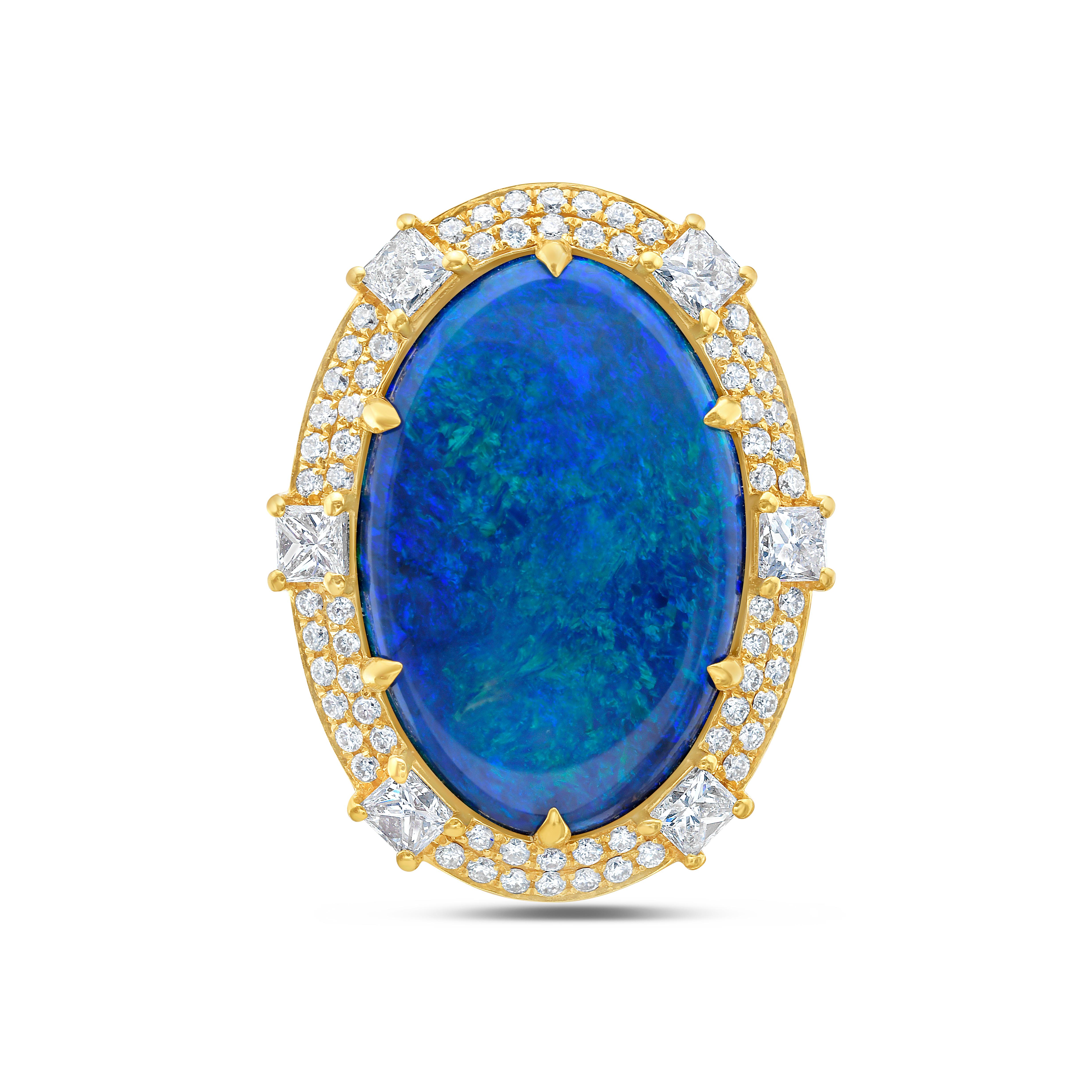 This stunning cocktail ring showcases a beautiful 10.98 Carat Lightning Ridge Oval Black Opal with a Diamond Halo on a Diamond Shank. 

This ring is set in 18k Yellow Gold, with 18k yellow gold prongs on the center stone.
Total Diamond Weight = 2.02