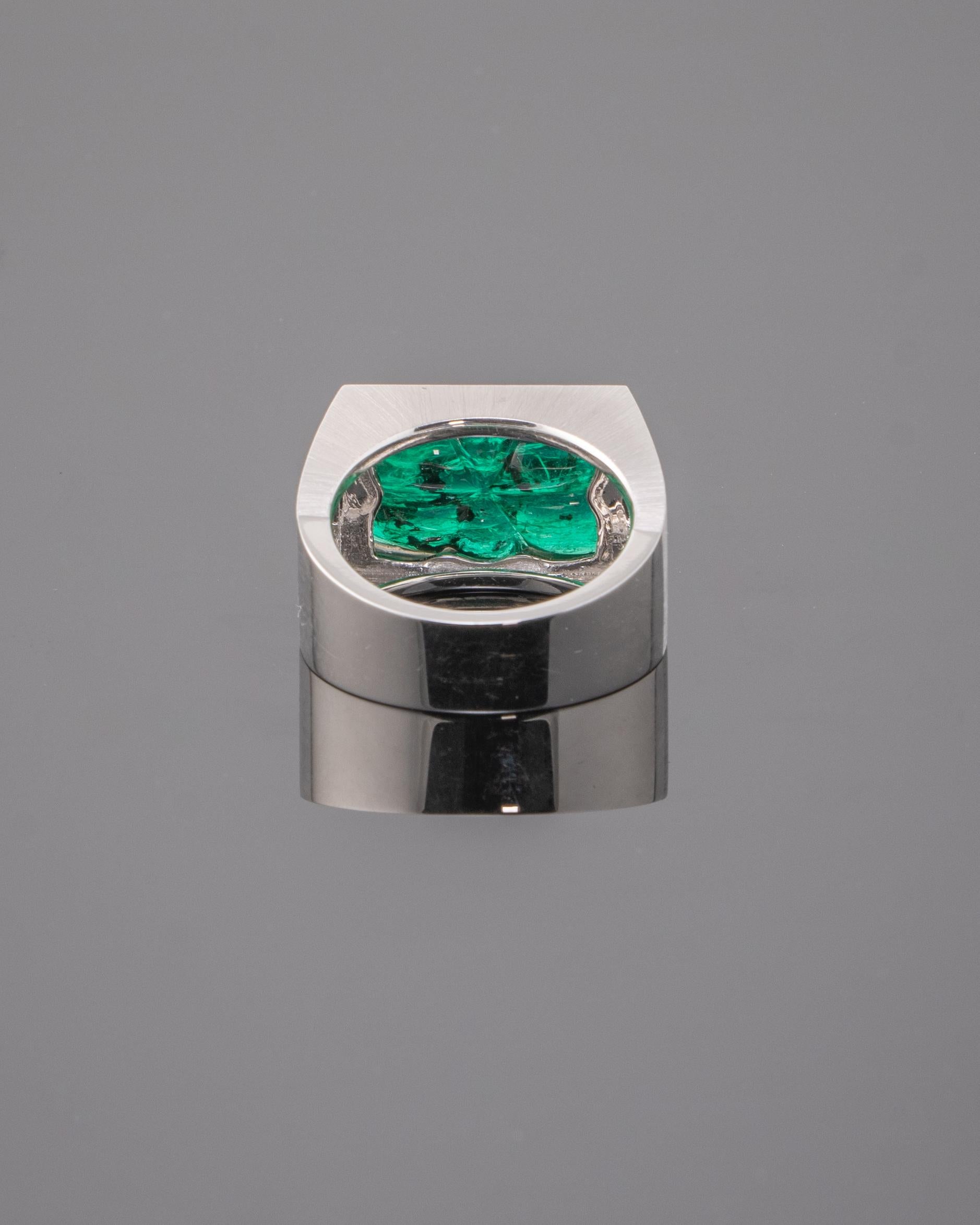 Emerald Cut 10.99 Carat Carved Emerald and 18 Karat White Gold Ring For Sale