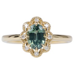 1.09ct Oval Montana Sapphire with Diamond Halo 14K Yellow Gold Engagement Ring