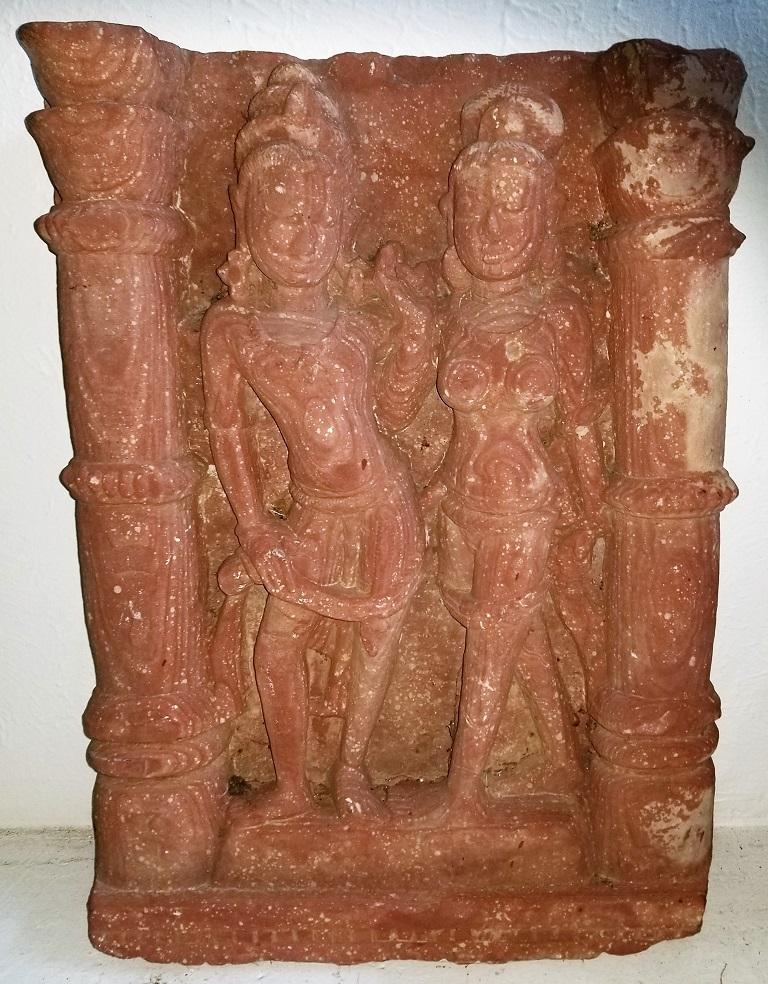 Presenting a stunning piece of southeast Asian antiquity, namely, a 10th century red sandstone relief of a mithuna couple.

This piece has impeccable Provenance!

It was purchased by a Private Dallas Collector at Christie’s New York Auction on