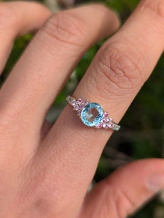 Anillo de oro de 9 quilates con un conjunto de diamantes, aguamarina azul de 1,0 ct y zafiro rosa, talla N / 6,75