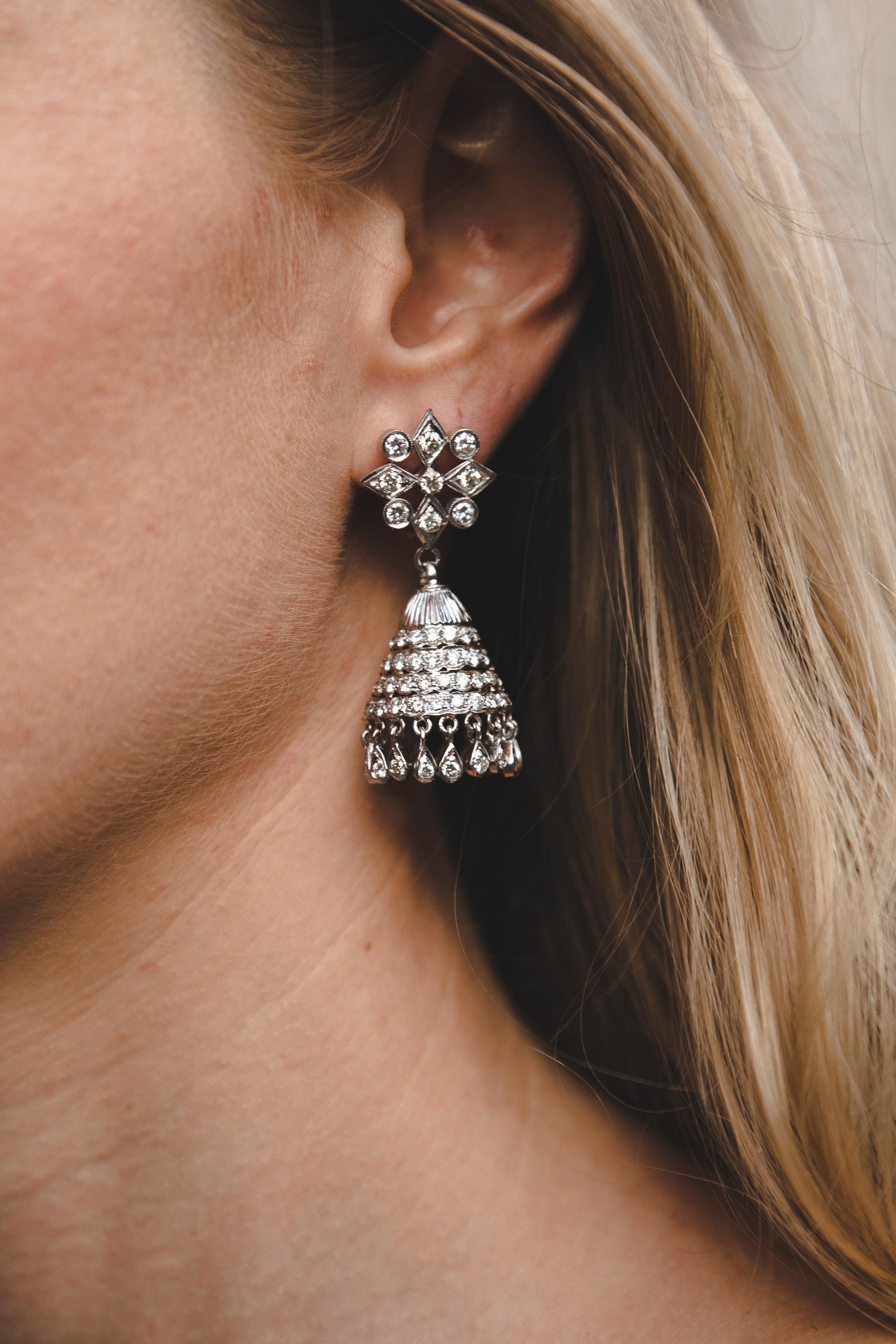 10 Carats Diamond Chandelier Earrings White Gold, 1970
Diamonds Chandelier Earrings with 10 Ct in more than 100 stones total. Fine earrings with exceptional work of jeweler, all moving parts create a lovely effect on the ear. Using so many Diamonds