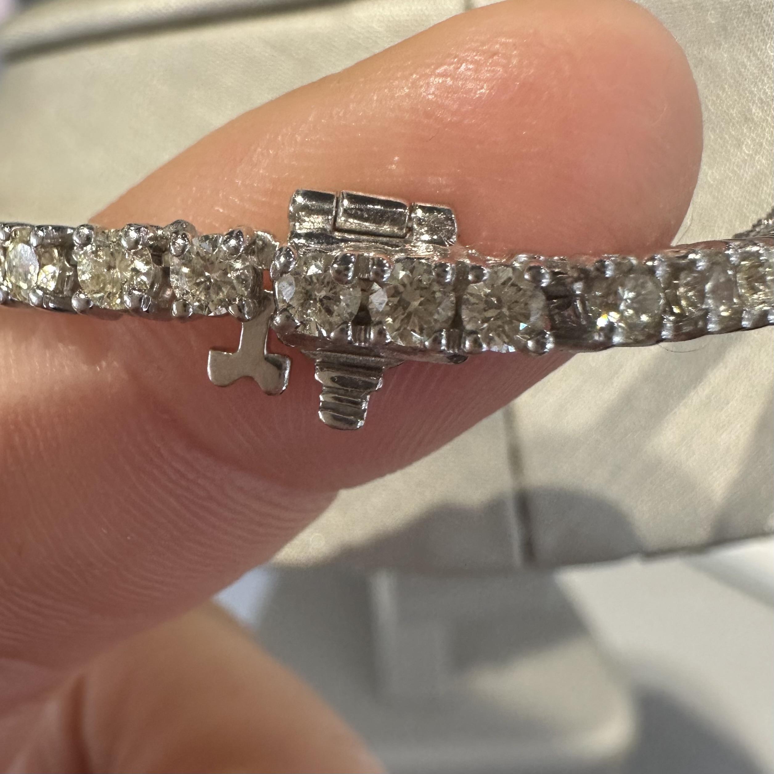 Style: Tennis Necklace
Material: White Gold
Metal Purity: 14k
Stones: Diamonds
Carat Weight: 10ct
Diamond Color: L-M
Diamond Clarity: SI1-SI2
Length: 22.5 inches
