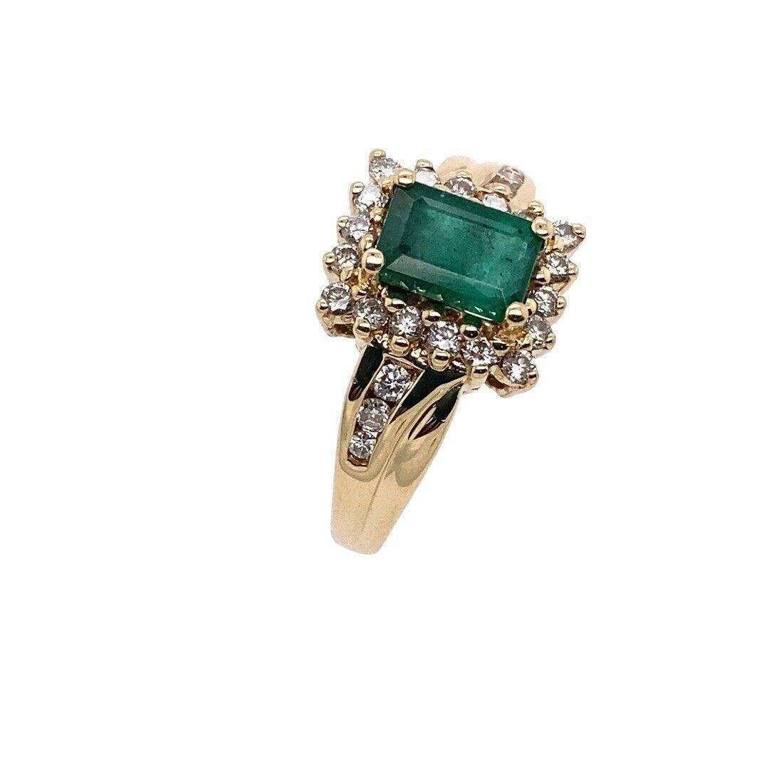 1.0ct Emerald Cut Emerald Surrounded By 18 Diamonds,0.25ct In 14ct Yellow Gold

This elegant Emerald cut Emerald ring surrounded by 18 round brilliant cut Diamonds is a timeless piece made to perfection. The 0.25ct total carat weight of diamonds