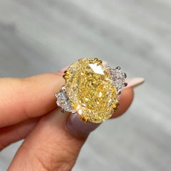 10ct Fancy Yellow Oval Diamond Three Stone Ring