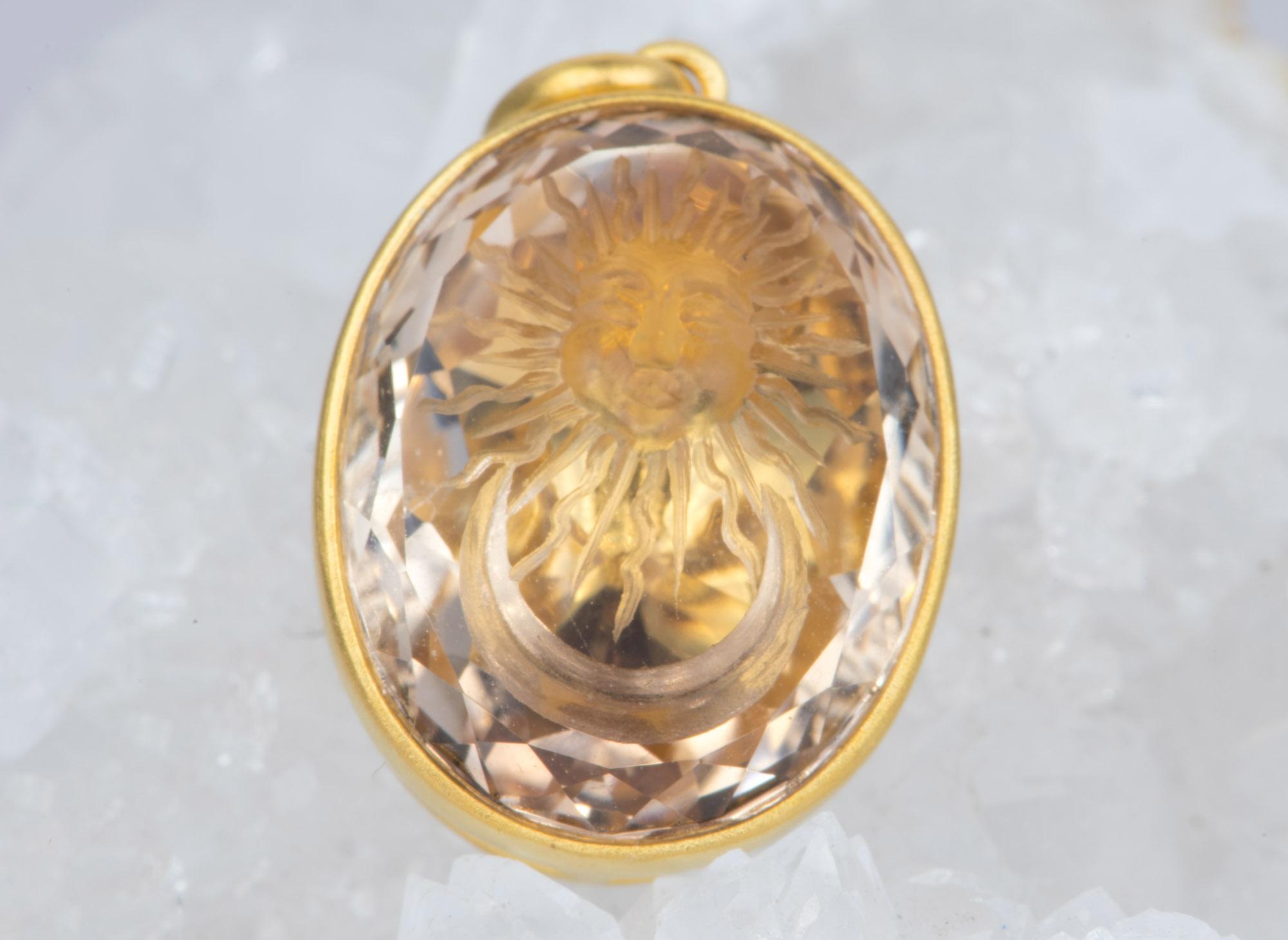 ♥  This is a pendant featuring a stunning hand-carved sun and moon intaglio topaz, bezel set in luxurious 14K yellow gold in a matte finish
♥  This listing is for the pendant ONLY. The chain shown in the photos do not come with the pendant.

♥ 