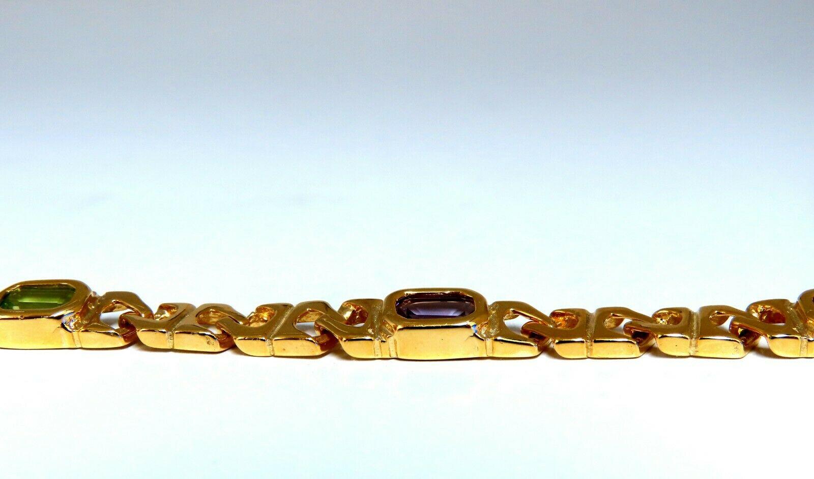 Hinge Linked 

10.00ct. Natural Amethyst Peridot & Citrine bracelet.

Emerald cuts, great sparkle.

Vibrant color, excellent colors.

Clean Clarity & Transparent.

Average: 6 X 4 mm 

Bracelet very well made,

Secure pressure clasp and safety
