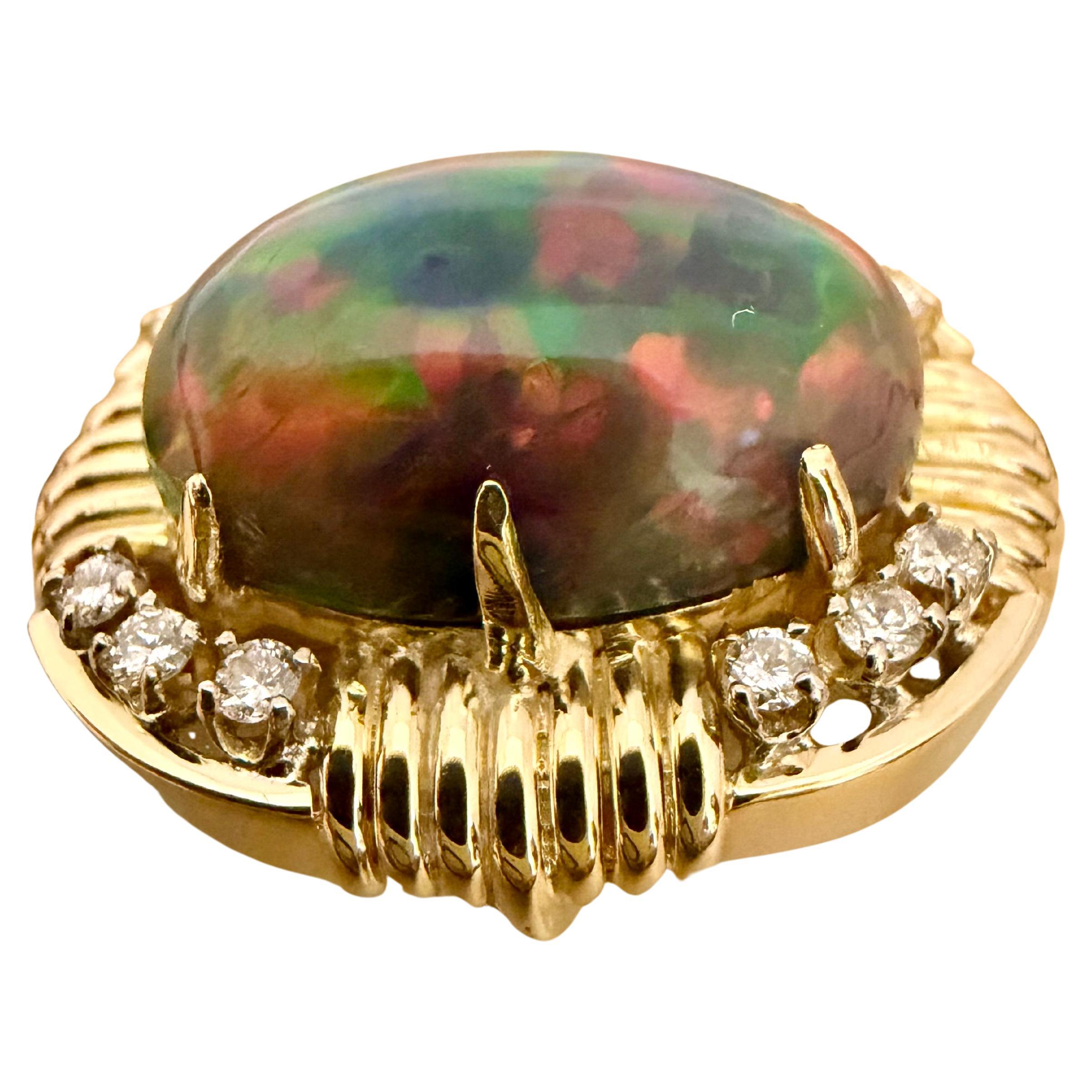 Anillo de cóctel de ópalo australiano negro, forma ovalada, de aproximadamente 10 ct, oro amarillo de 14 ct, TALLA 6.5
Presentamos nuestro cautivador Anillo de Cóctel de Oro Amarillo de 14 Kilates con un impresionante Cabujón de Ópalo Negro