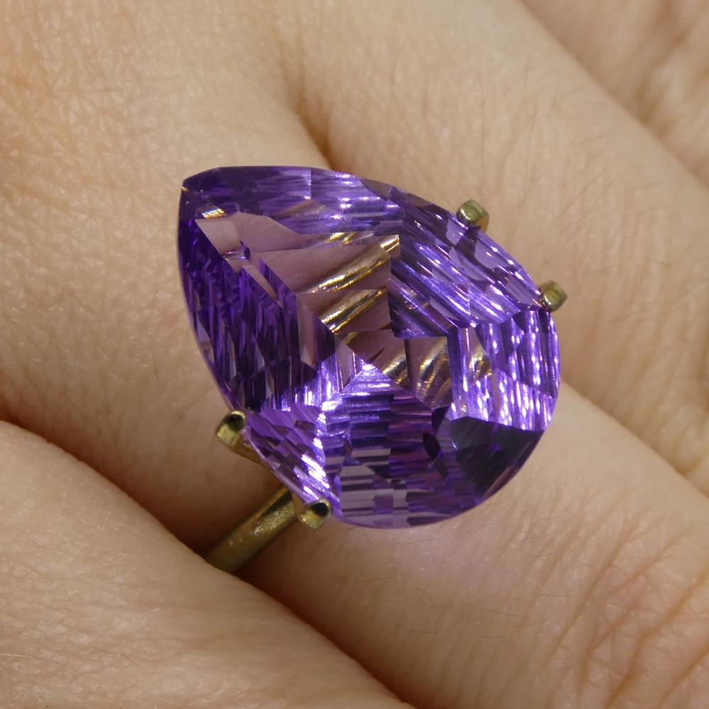 Description:

Gem Type: Amethyst
Number of Stones: 1
Weight: 10 cts
Measurements: 18.00 x 13.00 x 8.60 mm
Shape: Pear
Cutting Style Crown: Modified Brilliant
Cutting Style Pavilion: Mixed Cut
Transparency: Transparent
Clarity: Very Slightly