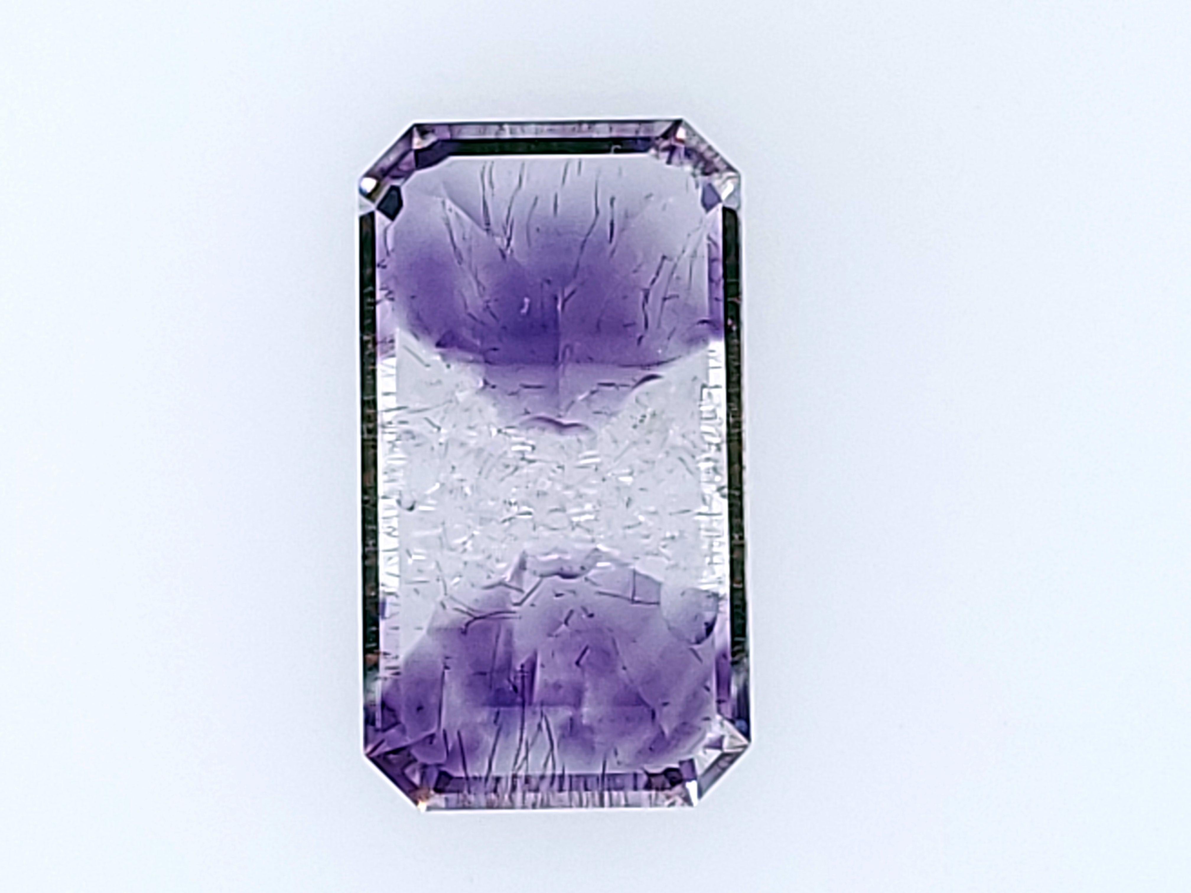 This is a rare type of Amethyst/Quartz that comes out of Morocco and a few other places of the world at times.  Some my call it Amethyst Bicolor, Amethyst Tricolor, Tricolor Quartz, Bicolor Quartz, etc.  It is essentially Amethyst whose chemical